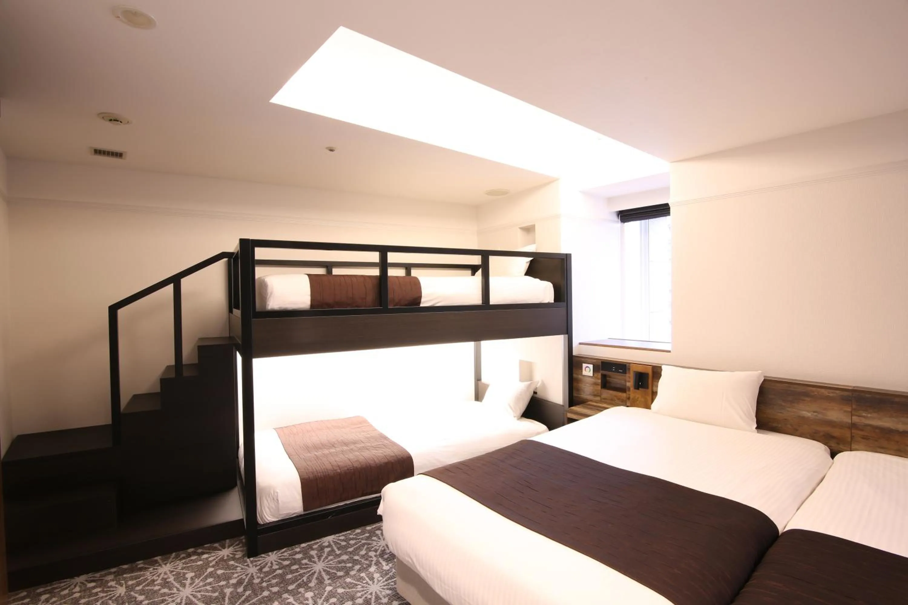 Photo of the whole room, Bed in Quintessa Hotel Sapporo