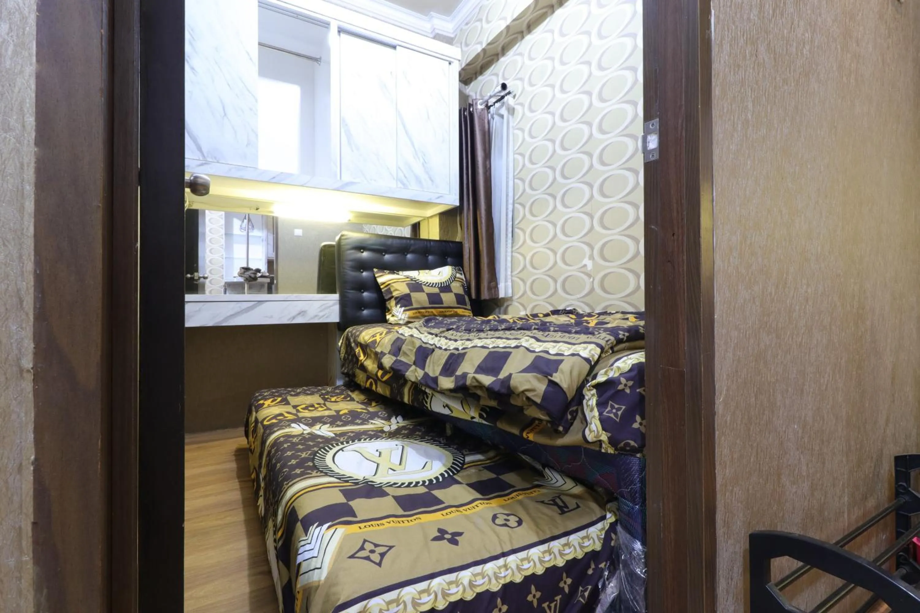 Bedroom, Bed in The Suite Metro Apartment by King Official