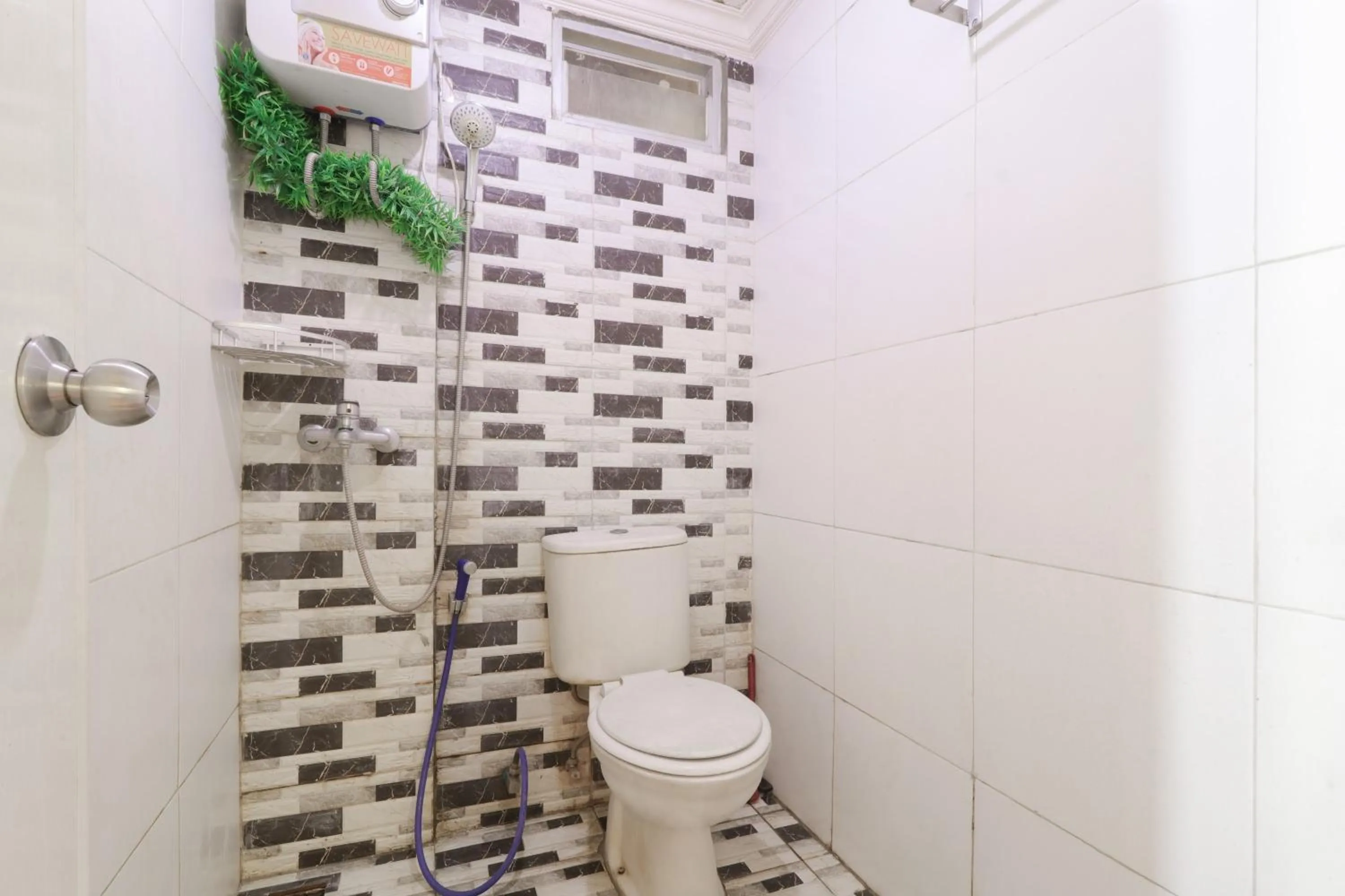 Bathroom in The Suite Metro Apartment by King Official