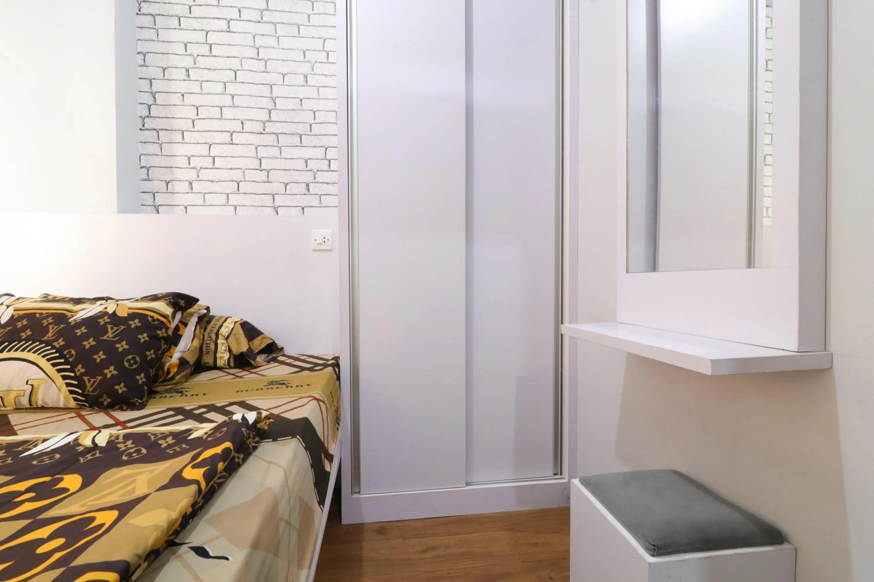 Bedroom, Bed in The Suite Metro Apartment by King Official