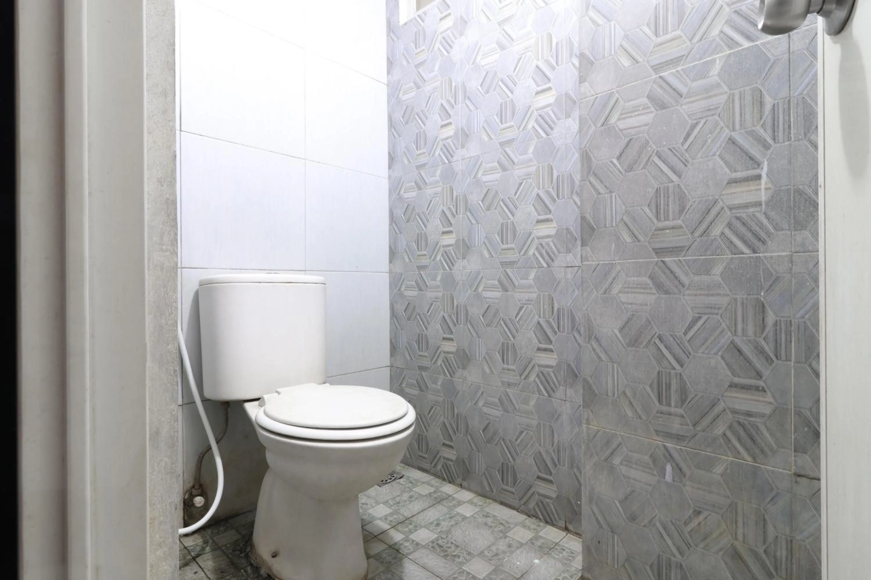 Bathroom in The Suite Metro Apartment by King Official