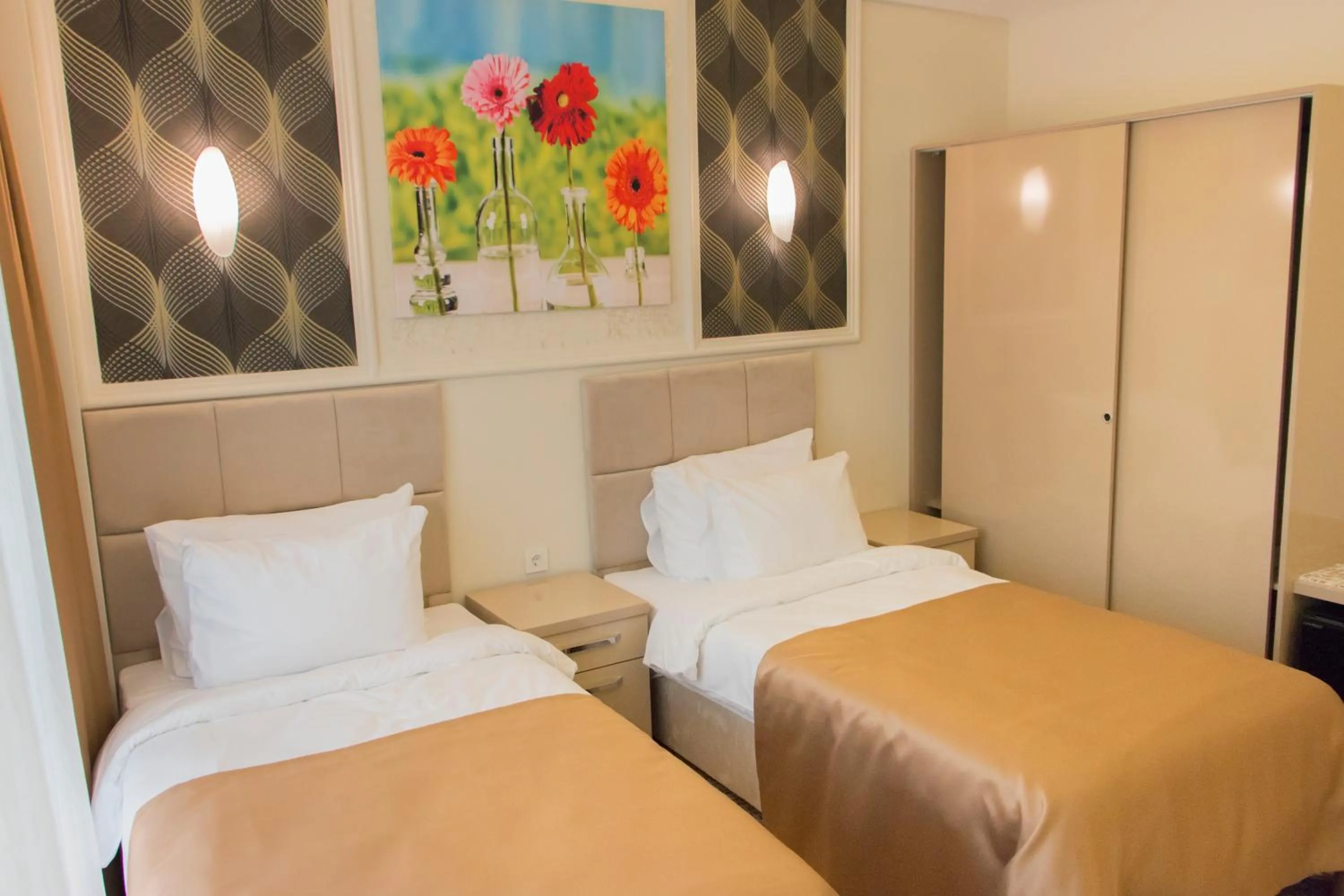 Bed in Goldhan Hotel