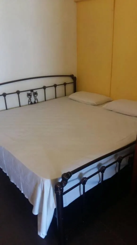 Bed in Cocoa Mews Cafe and Homestay