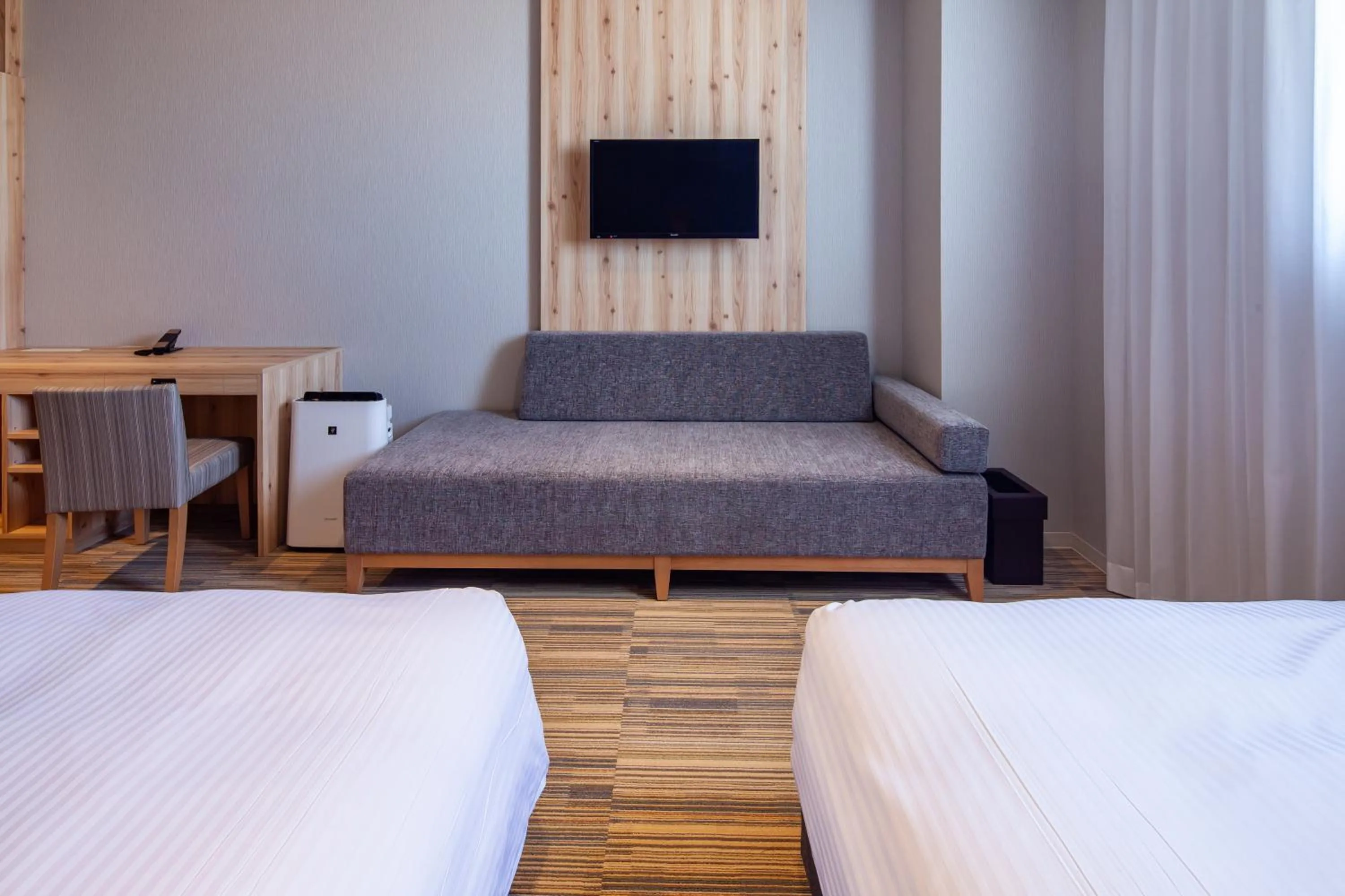 Photo of the whole room, Bed in Y's CABIN&HOTEL Naha Kokusai Street