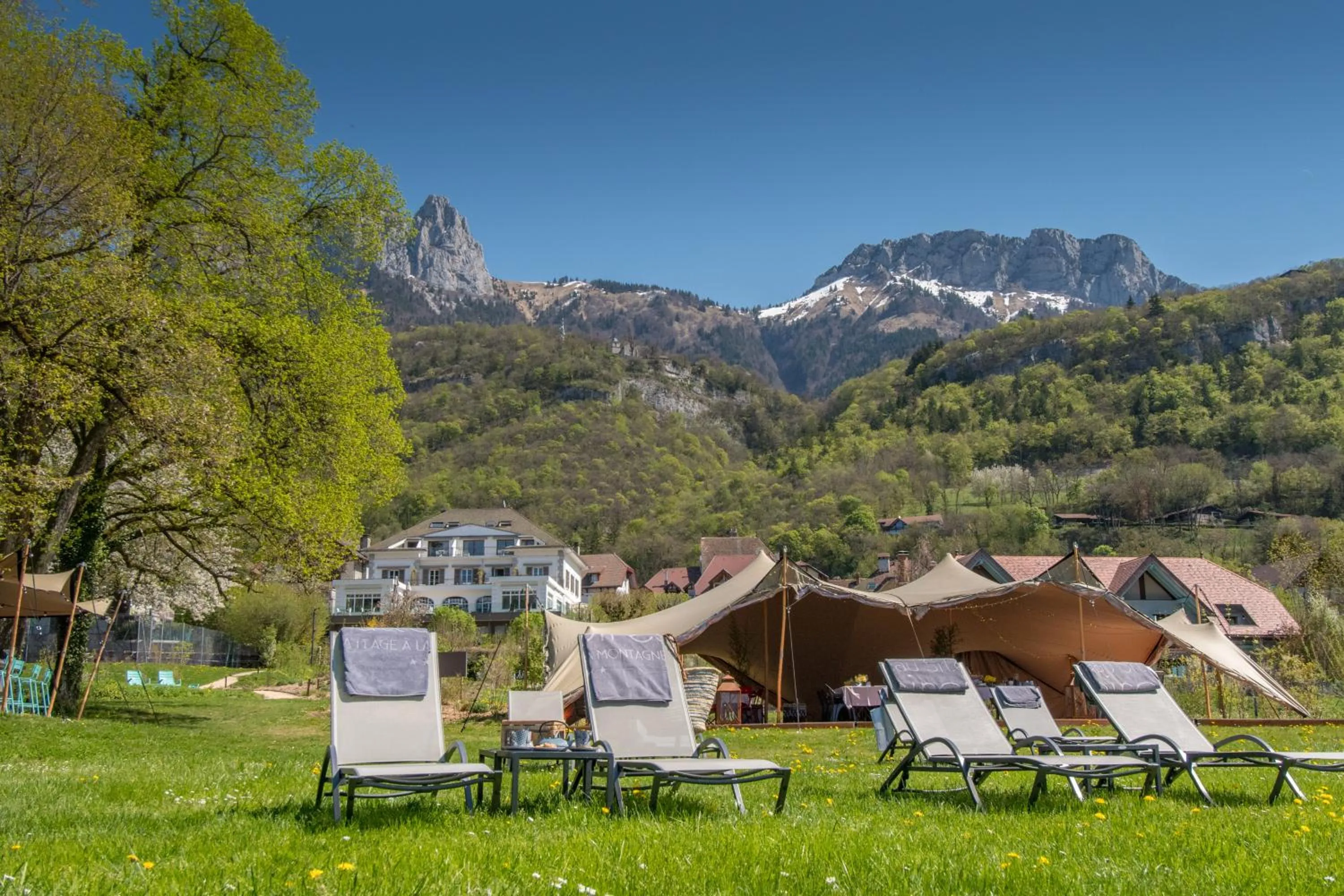 Garden view in Hôtel Beau Site Talloires B SPA