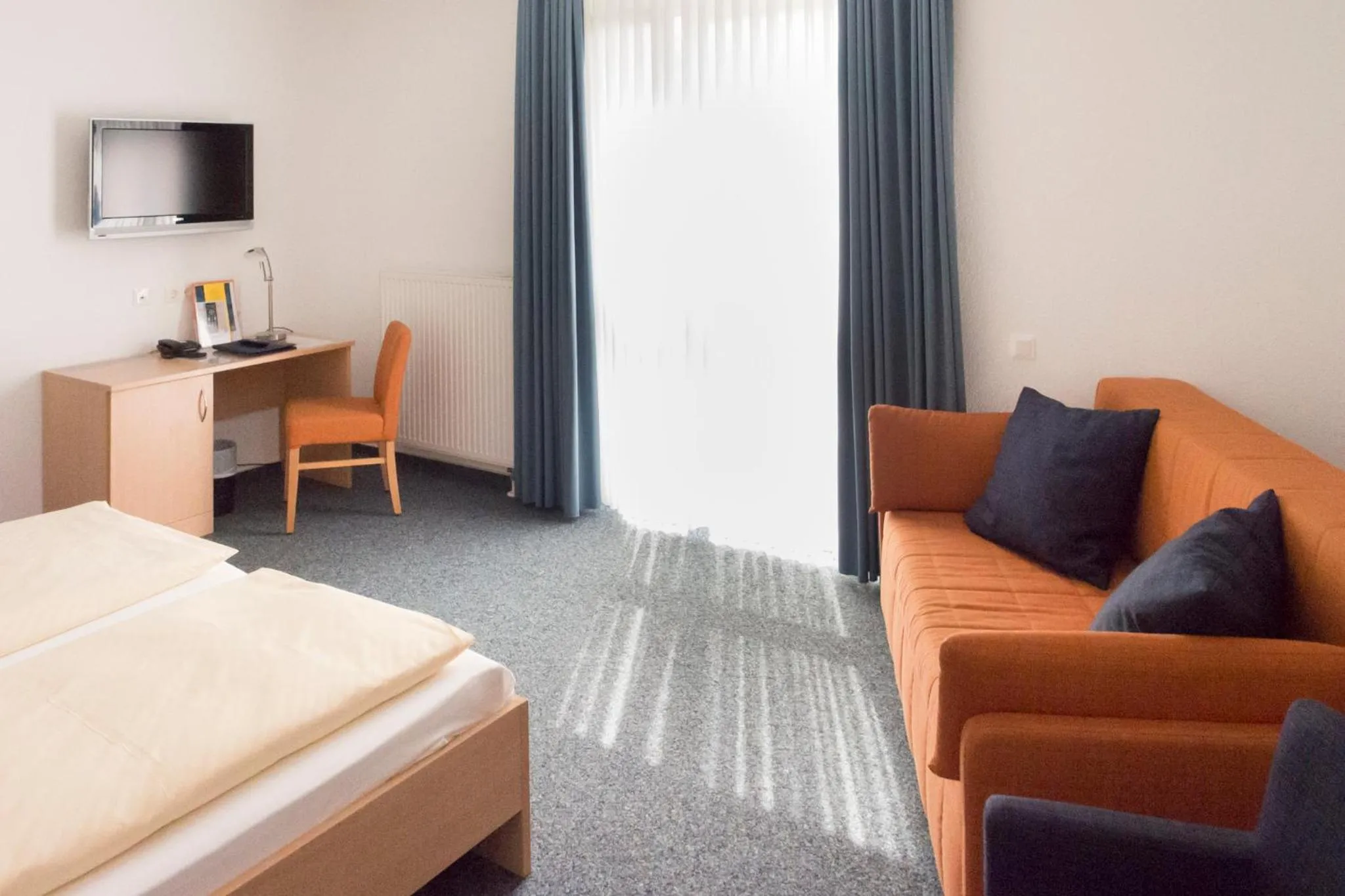 Photo of the whole room, Bed in Johanniter Gästehaus