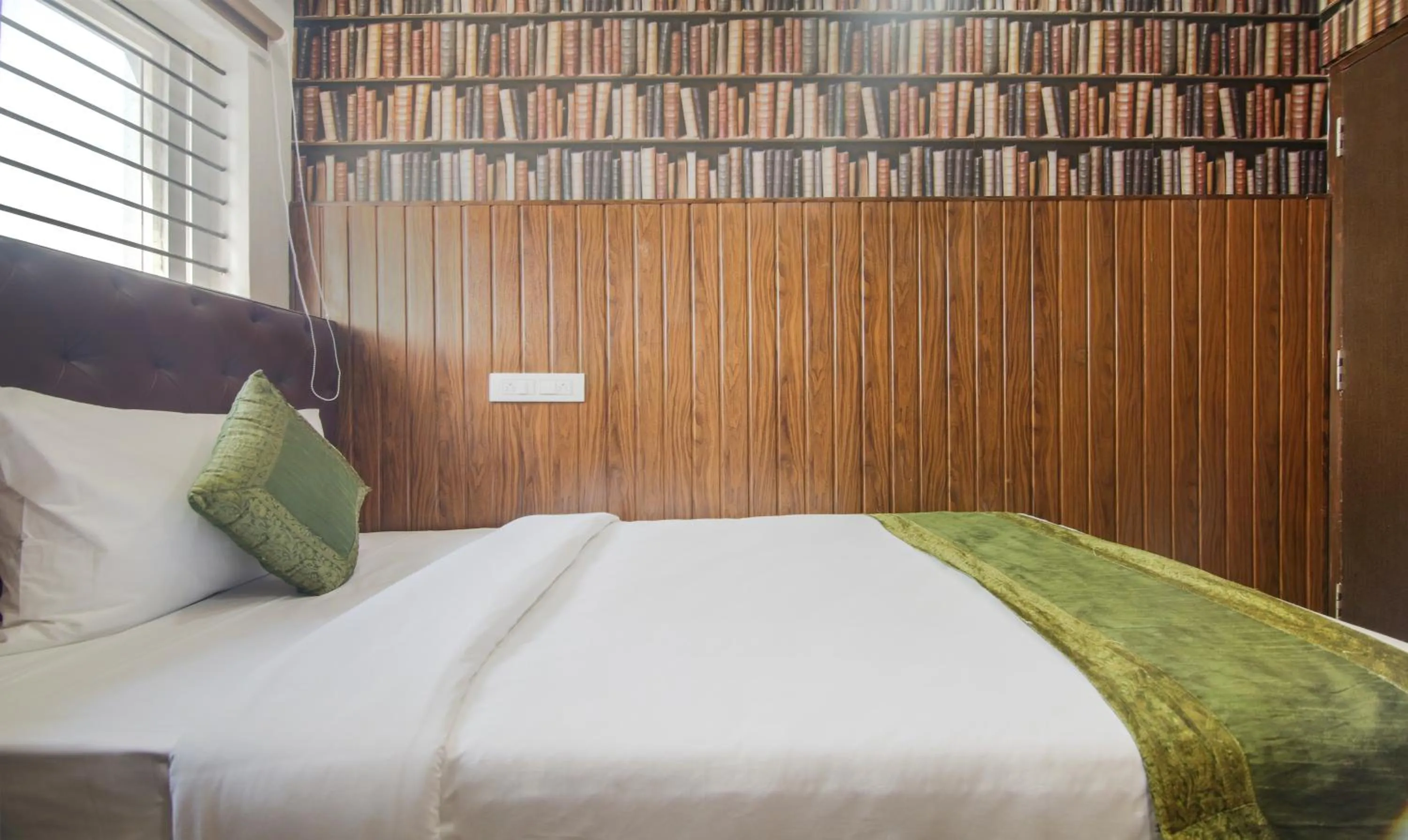 Bed in Hotel Dvaraka Inn