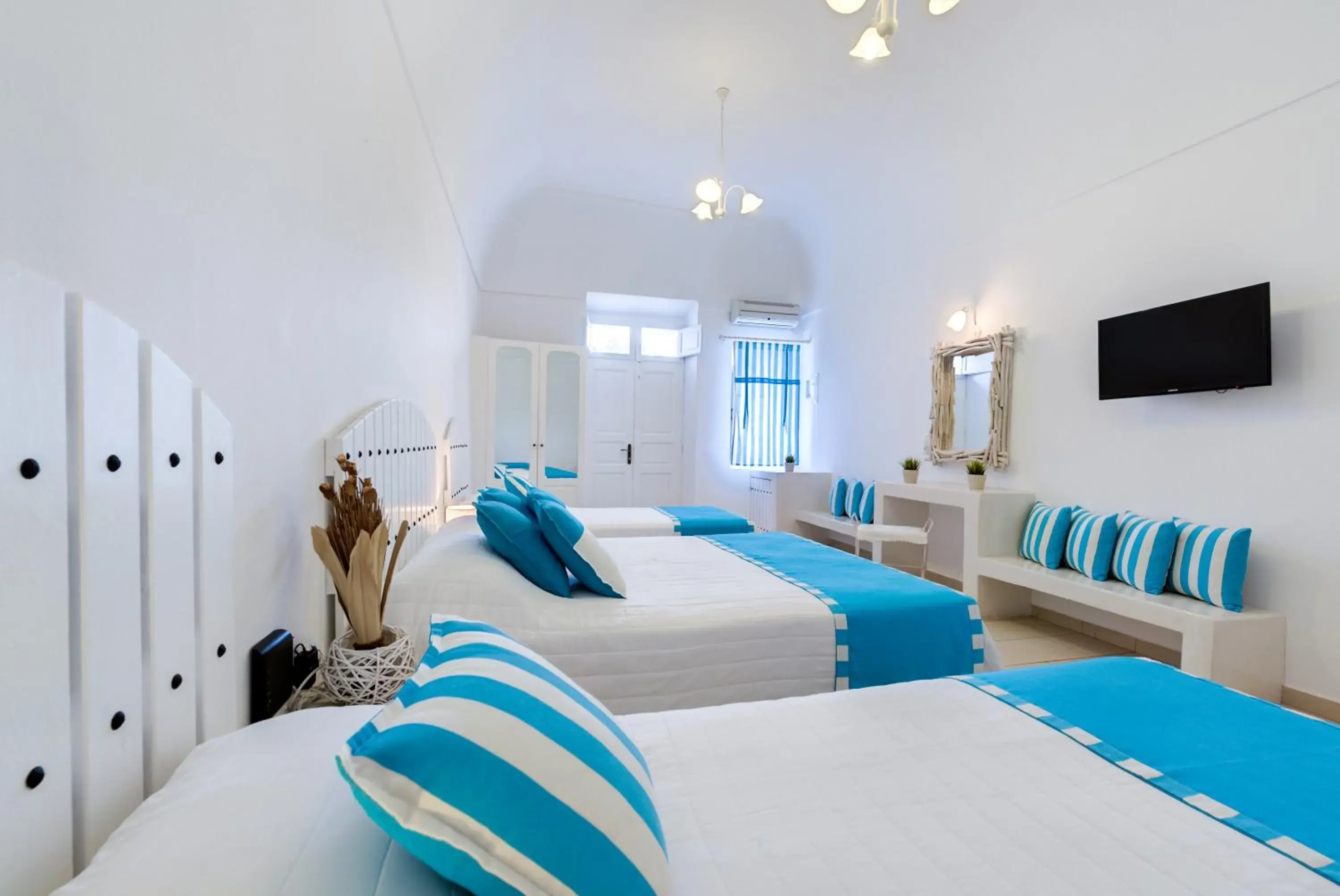 Quadruple Room with shared Patio in Dream Island Hotel Quadruple Room with shared Patio in Dream Island Hotel