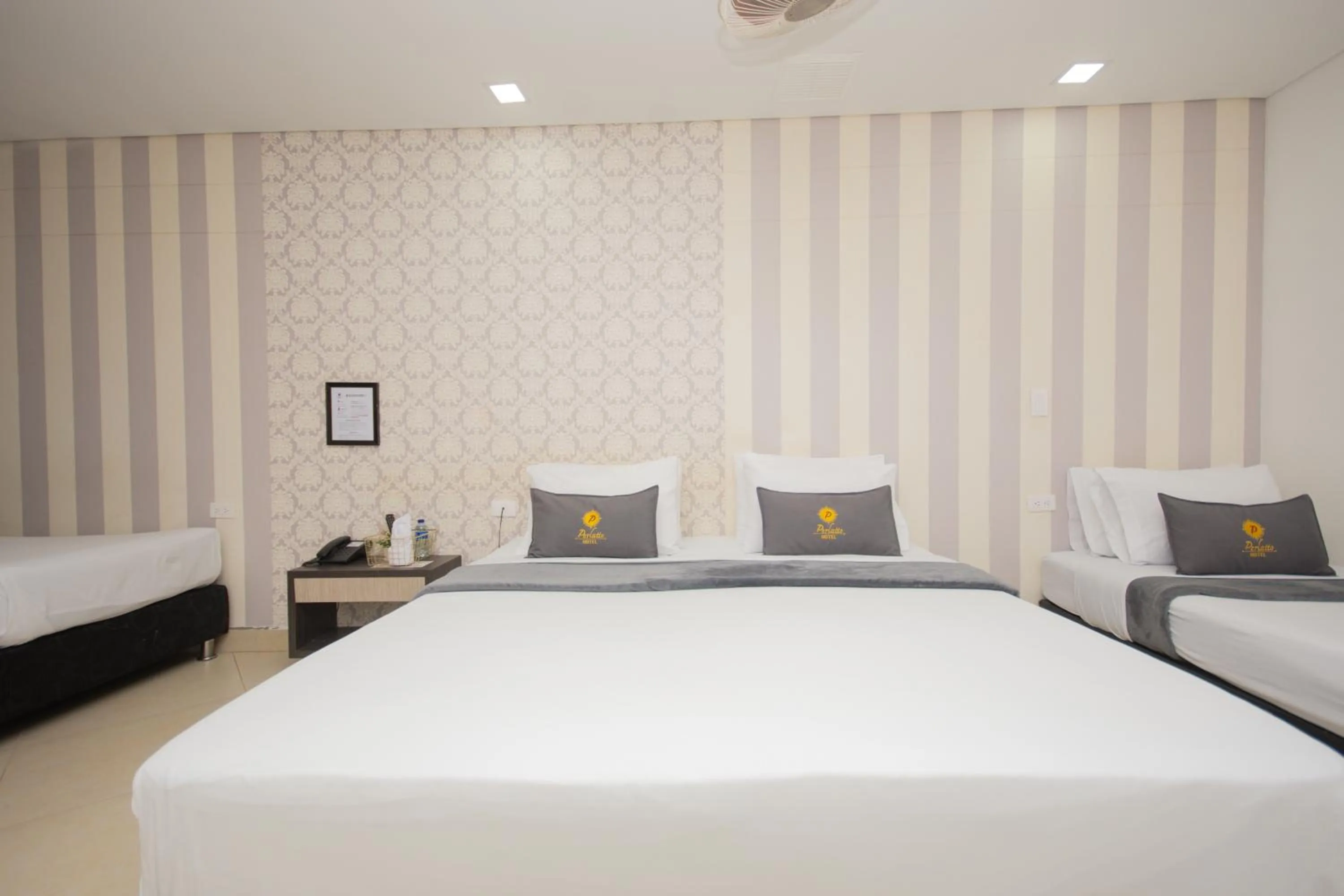 Bed in Hotel Perlatto