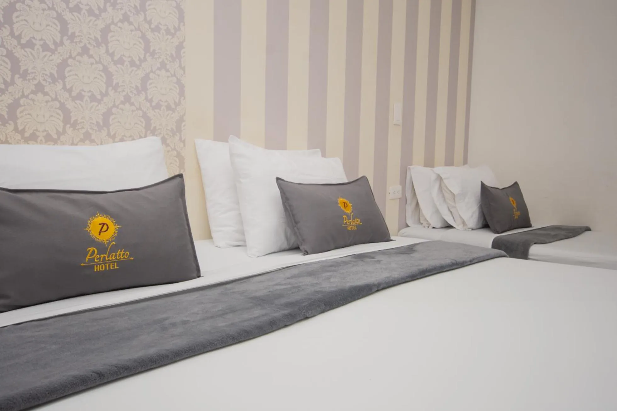 Bed in Hotel Perlatto