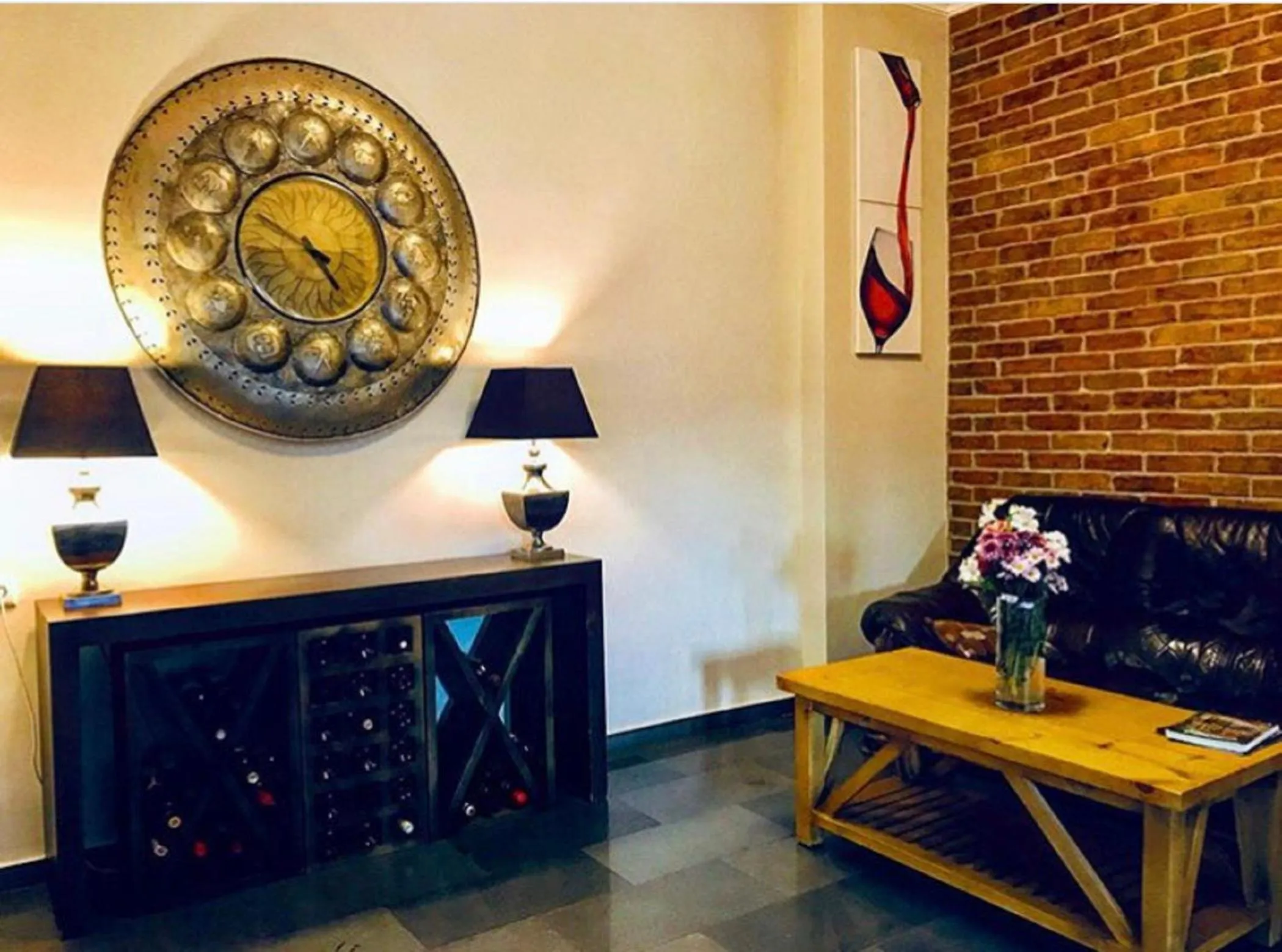 Communal lounge/ TV room in Eleon Boutique Hotel