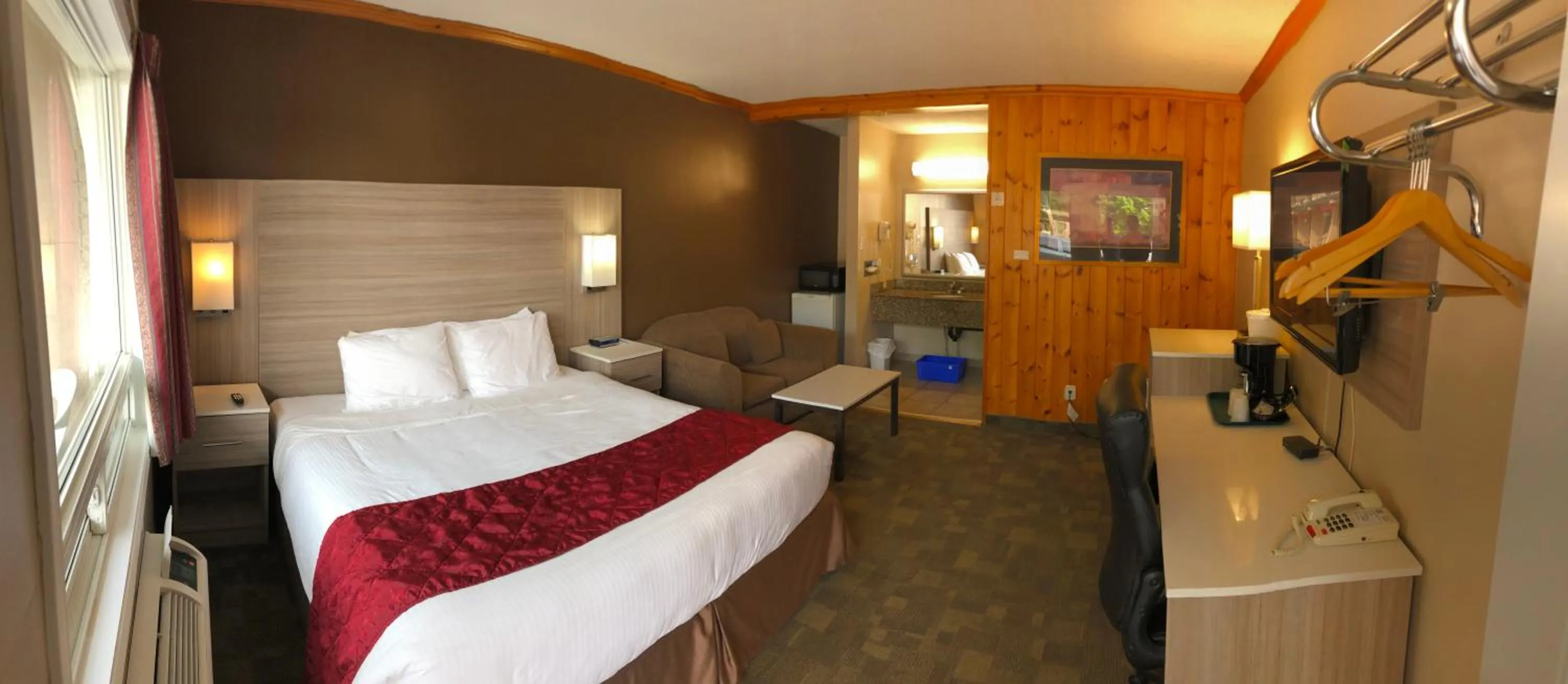 Bed in Knights Inn Huntsville