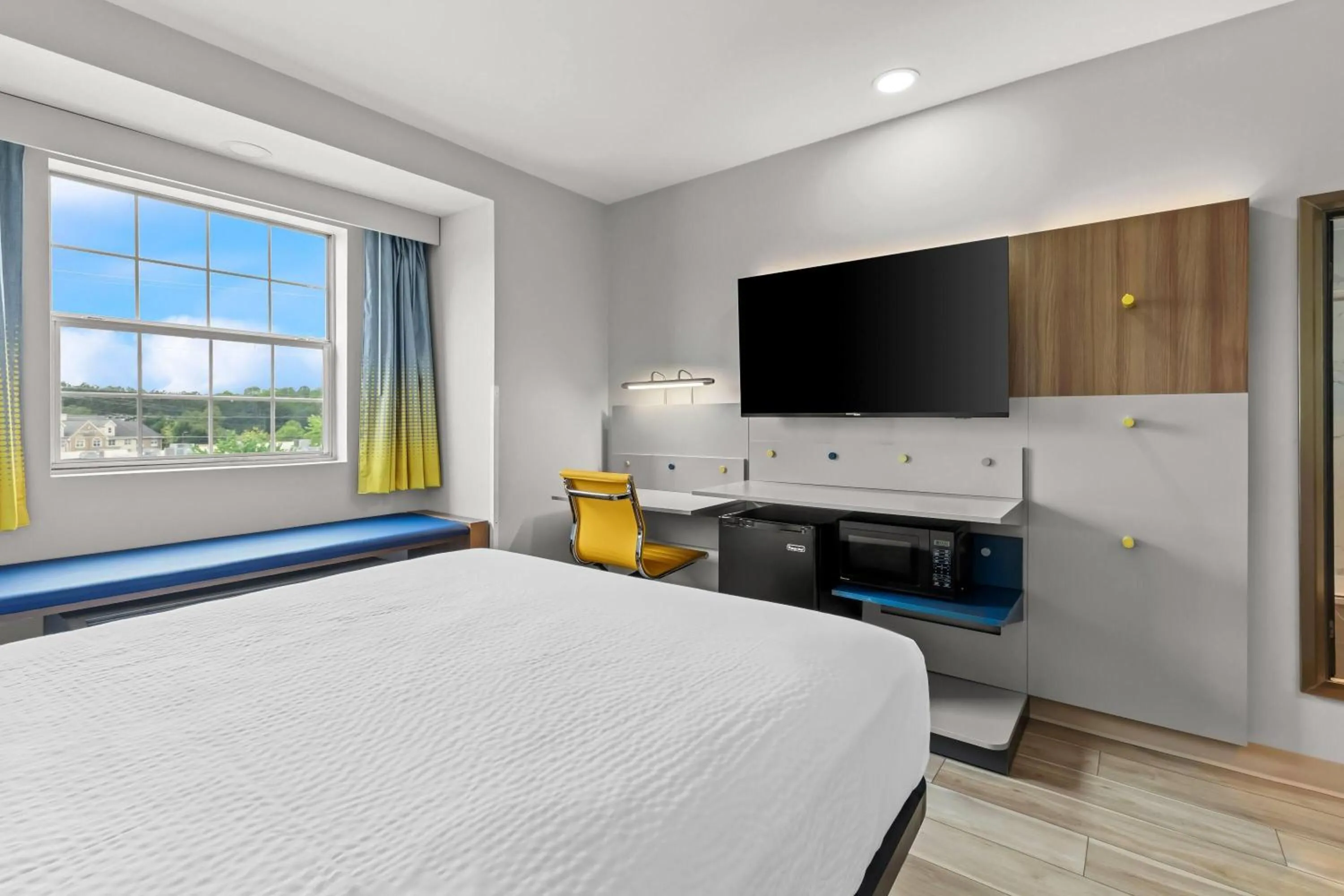 Bed in Microtel Inn & Suites by Wyndham Norcross