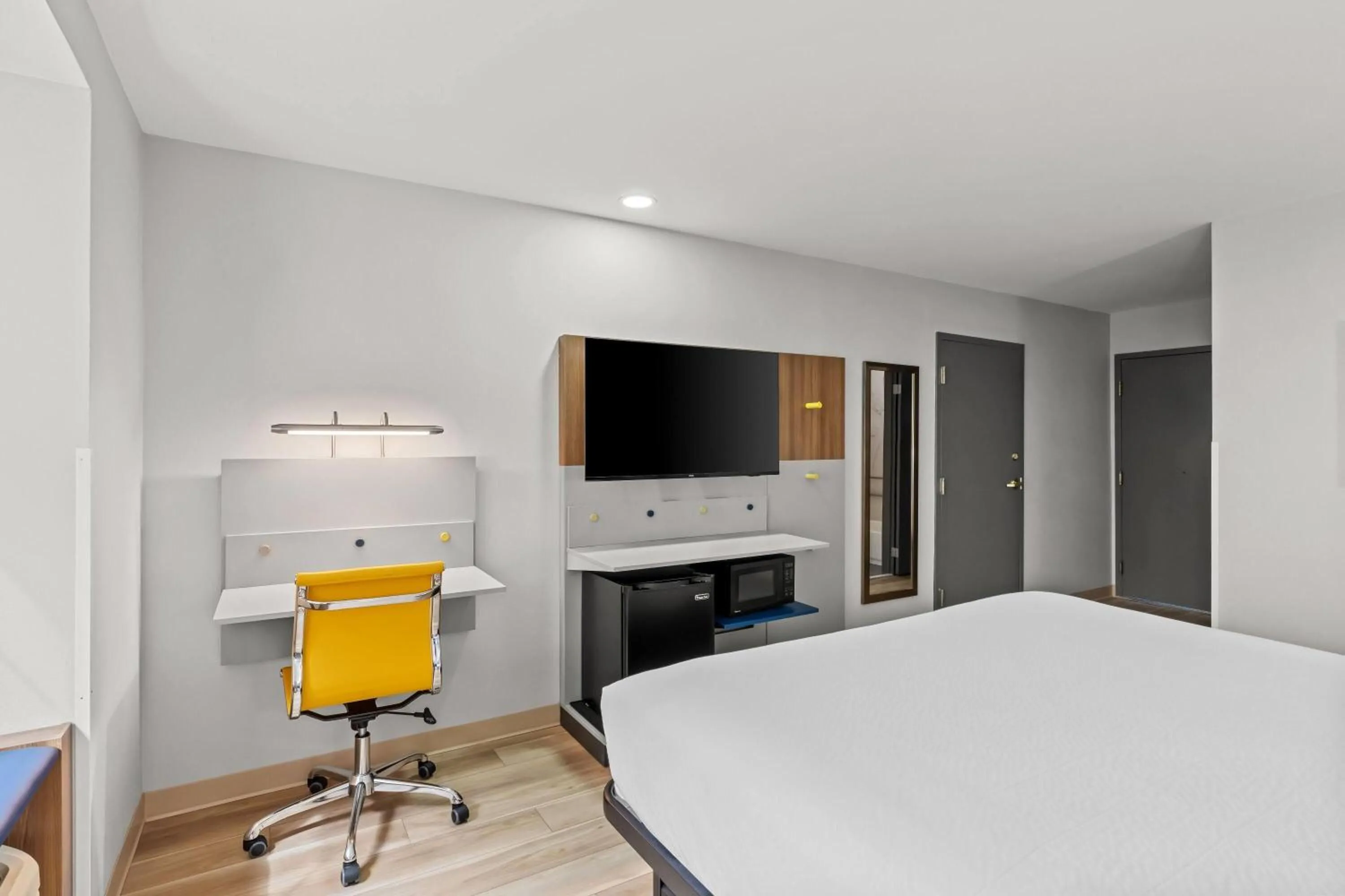 Bed in Microtel Inn & Suites by Wyndham Norcross