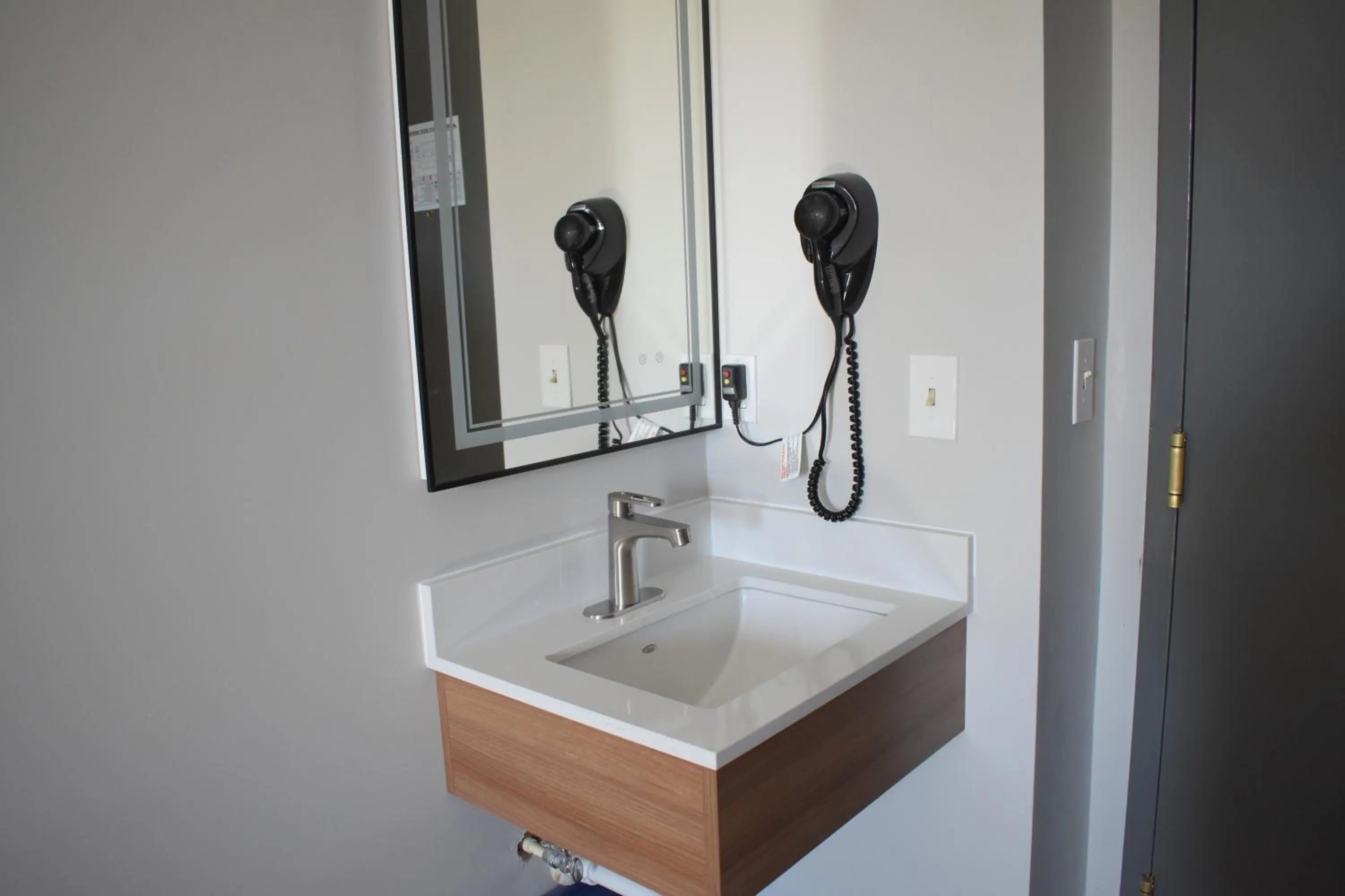 hair dryier in Microtel Inn & Suites by Wyndham Norcross