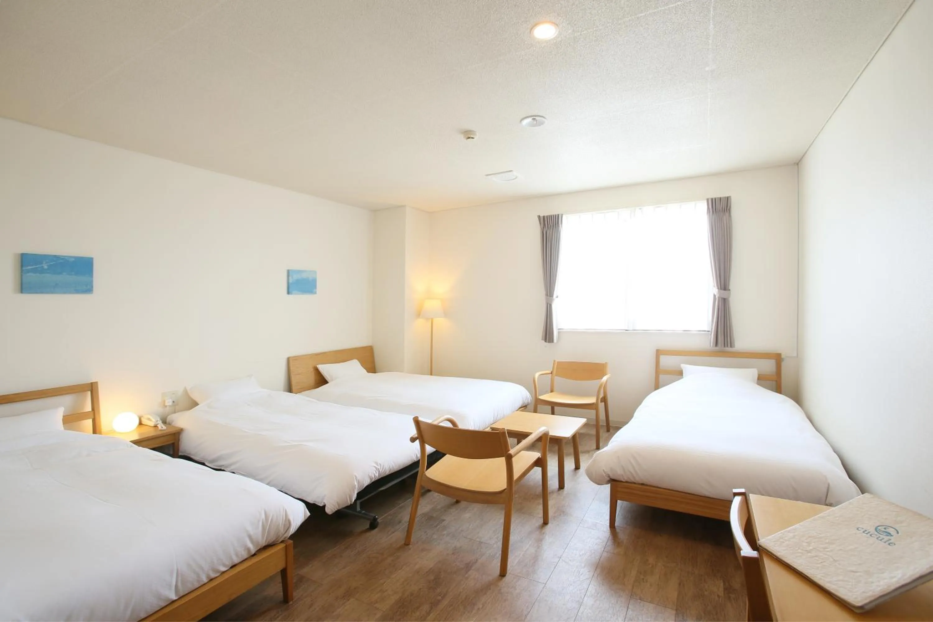 Photo of the whole room, Bed in Ishigakijima Hotel Cucule