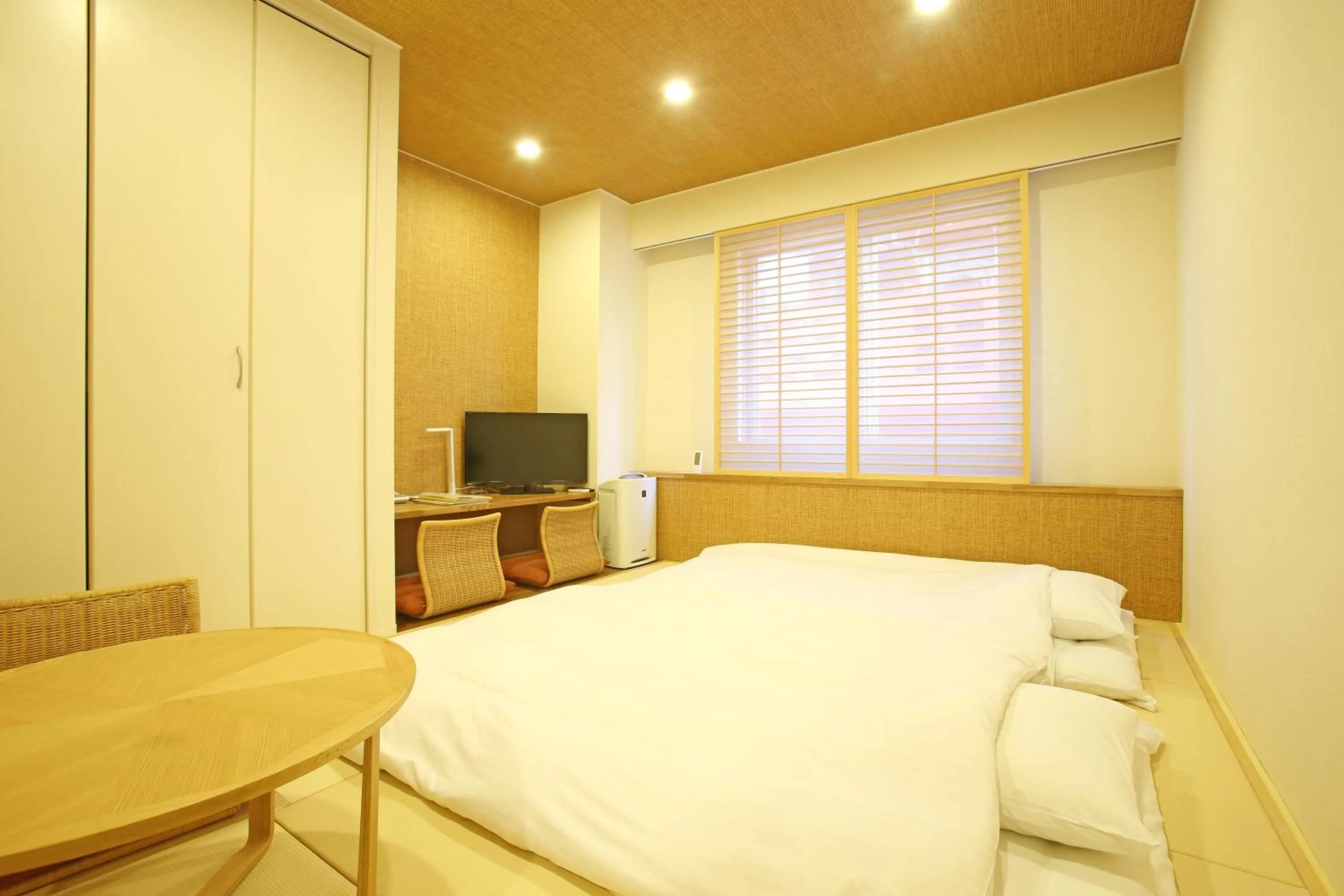 Photo of the whole room, Bed in Ishigakijima Hotel Cucule