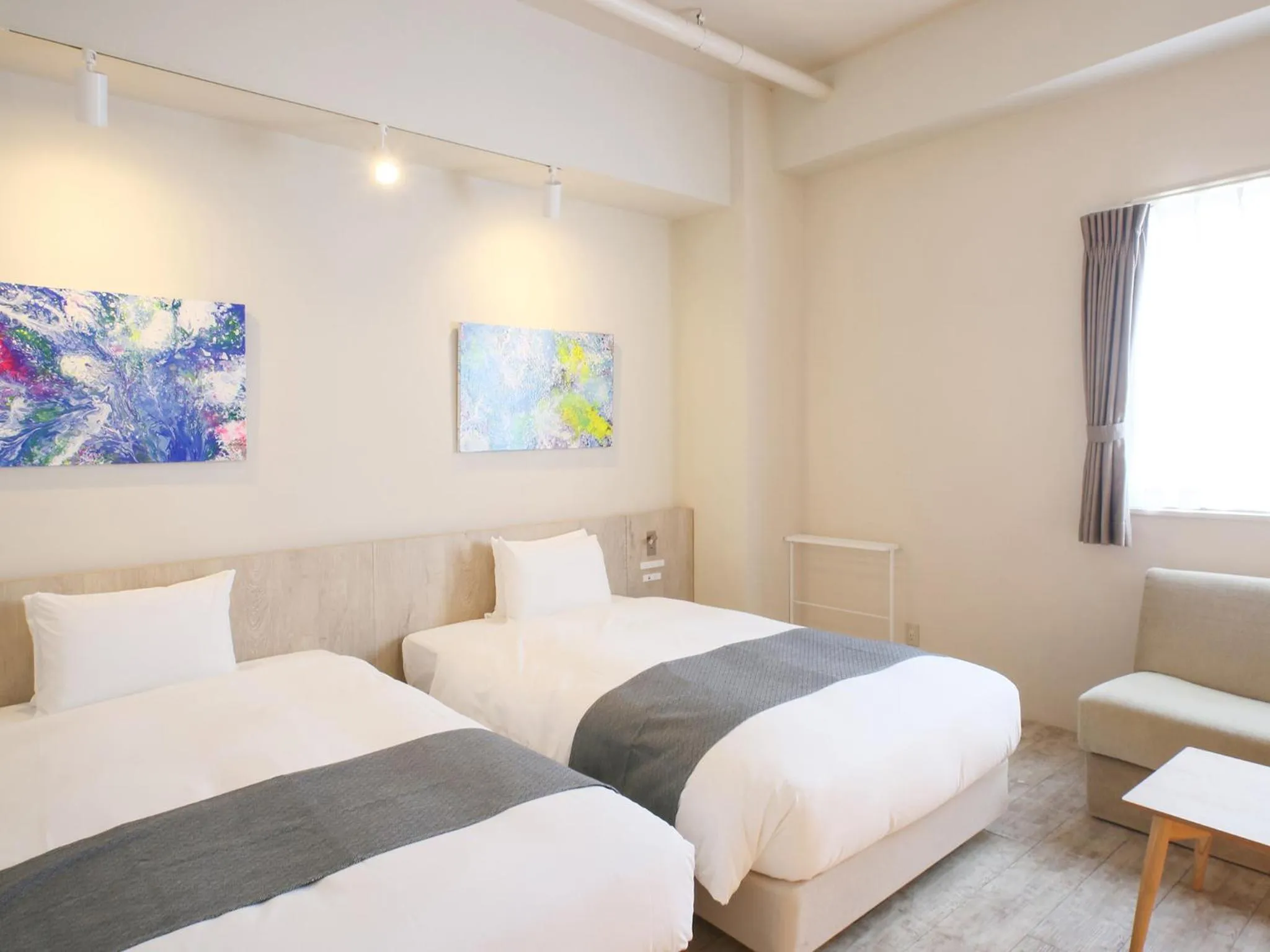 Bed in Ishigakijima Hotel Cucule