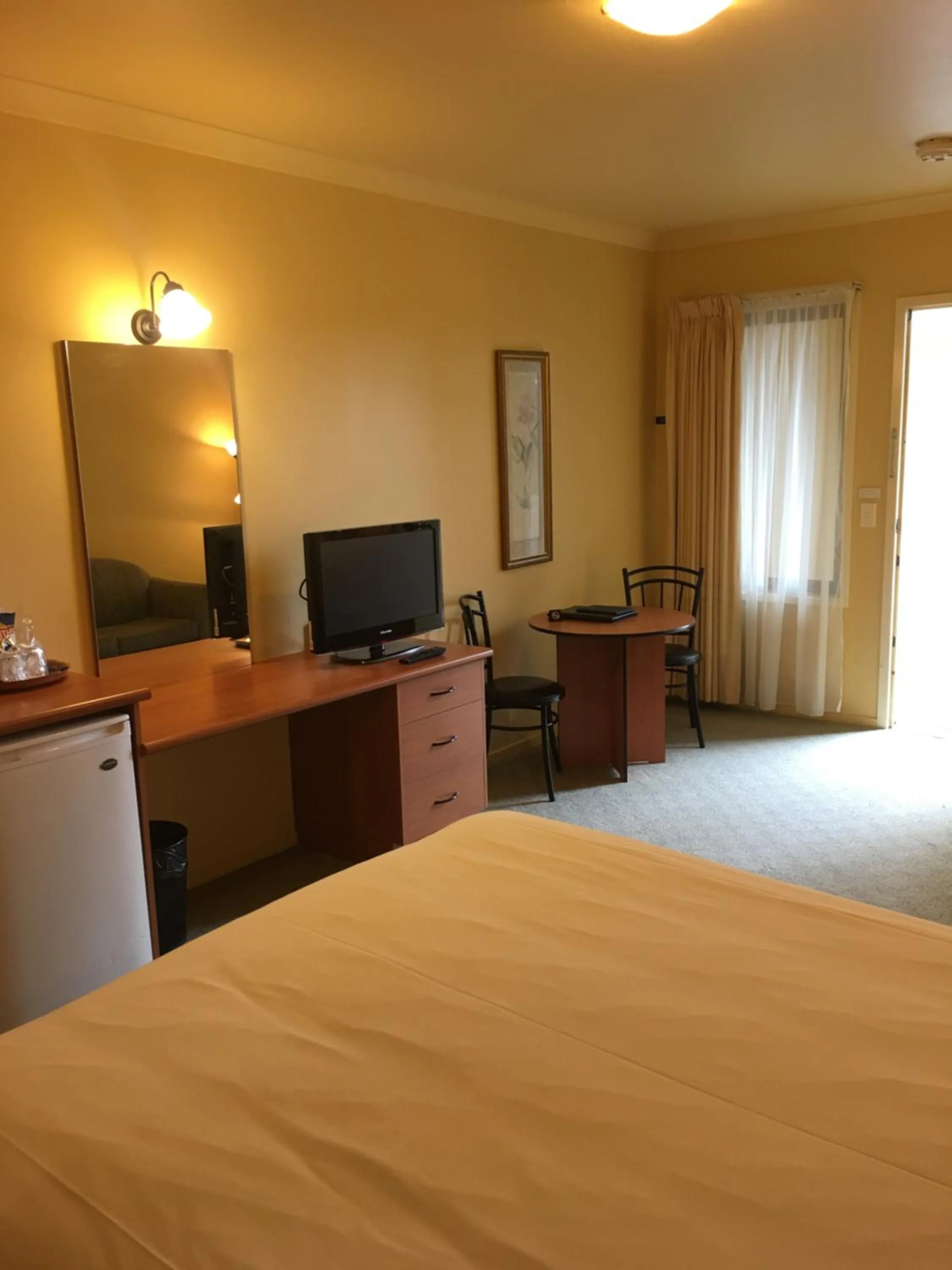 Photo of the whole room, TV/Entertainment Center in Hopkins House Motel and Apartments