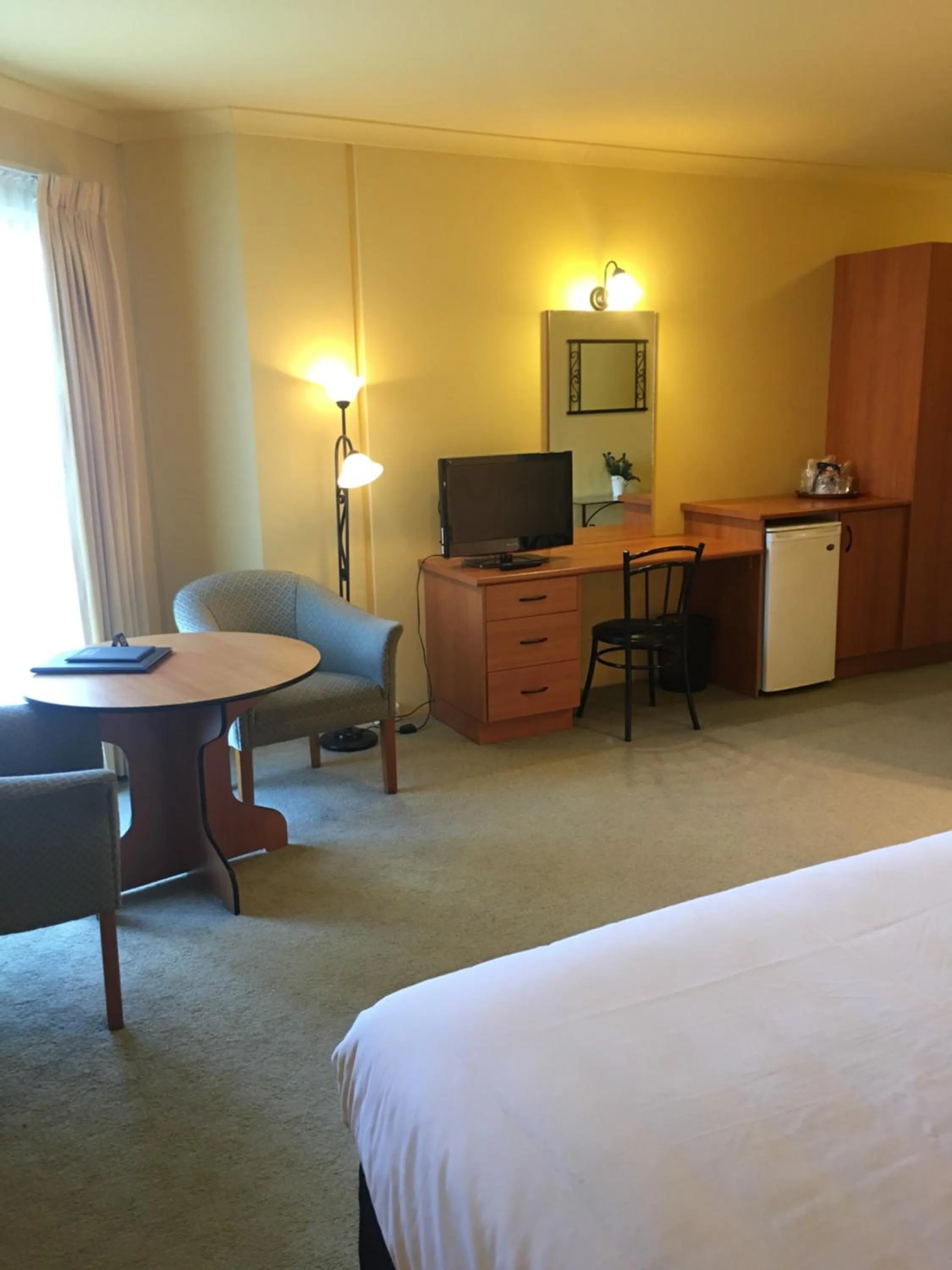 Photo of the whole room, TV/Entertainment Center in Hopkins House Motel and Apartments