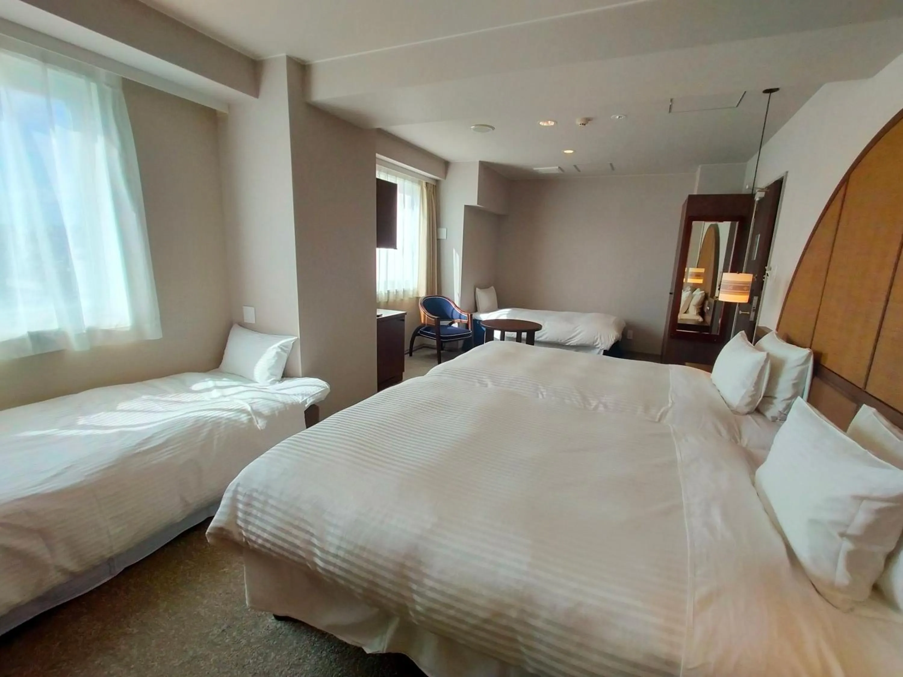 Bed in Hotel Palm Royal Resort Kokusai Street