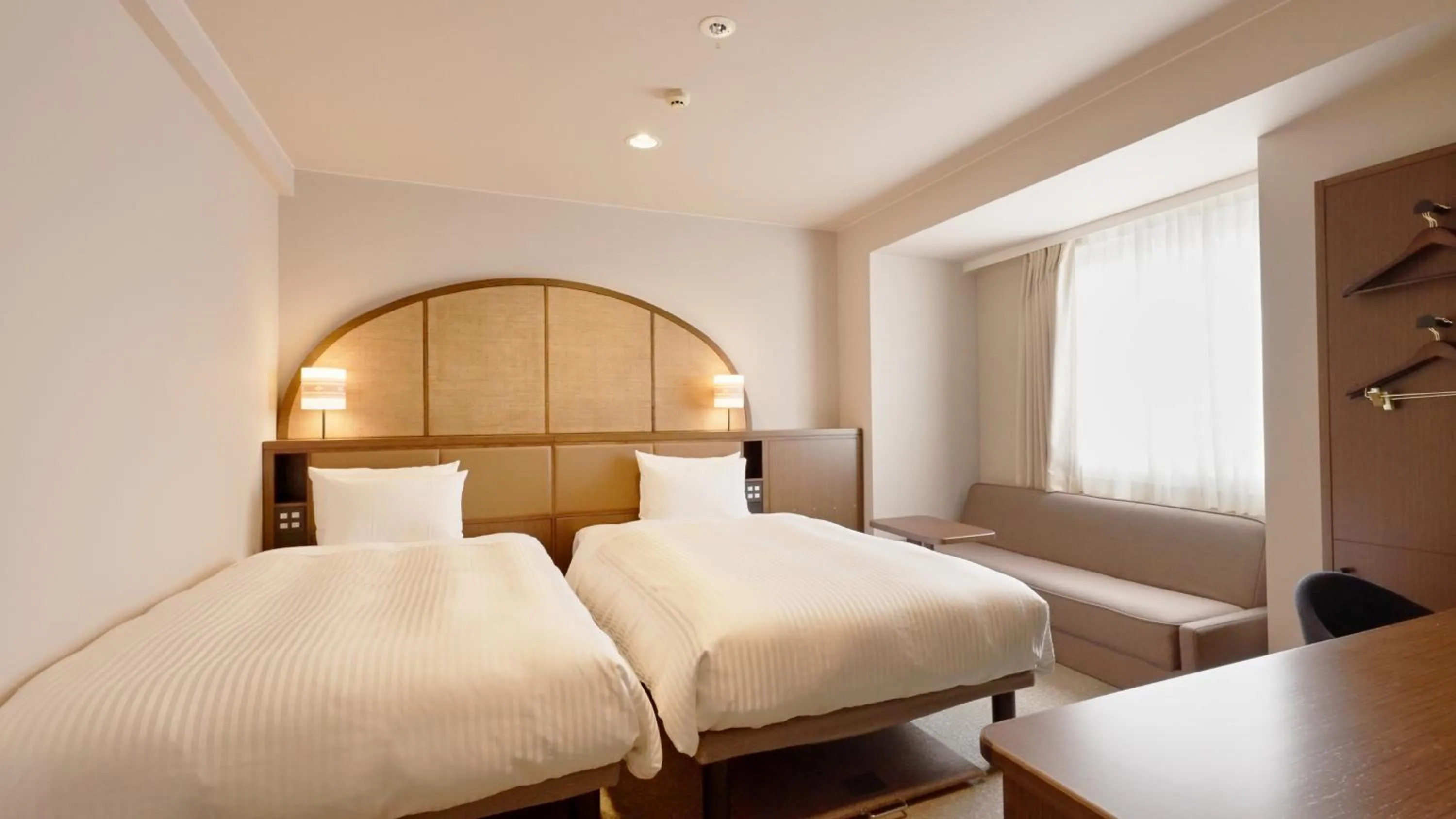 Bed in Hotel Palm Royal Resort Kokusai Street