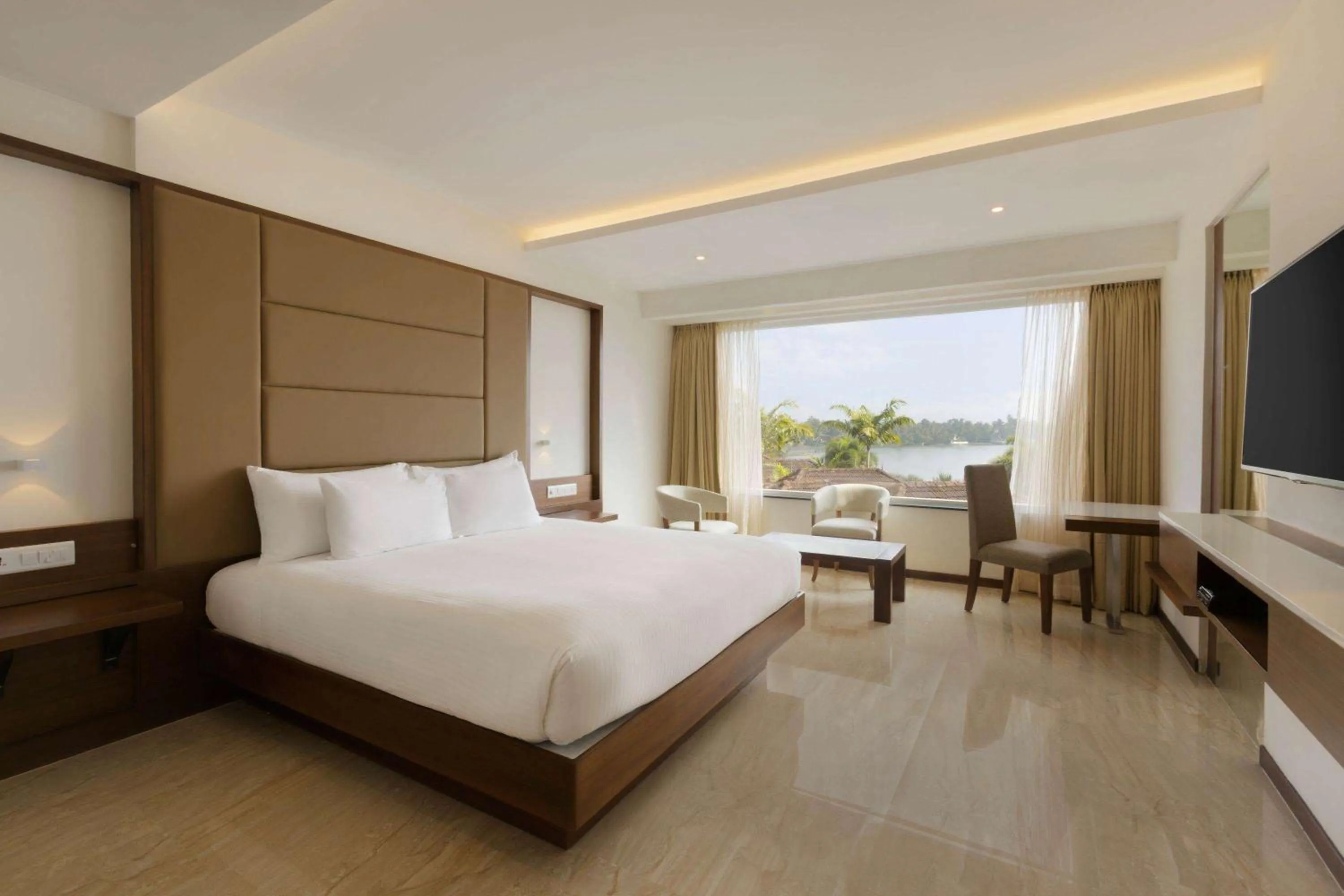 Photo of the whole room, Bed in Ramada Resort by Wyndham Kochi