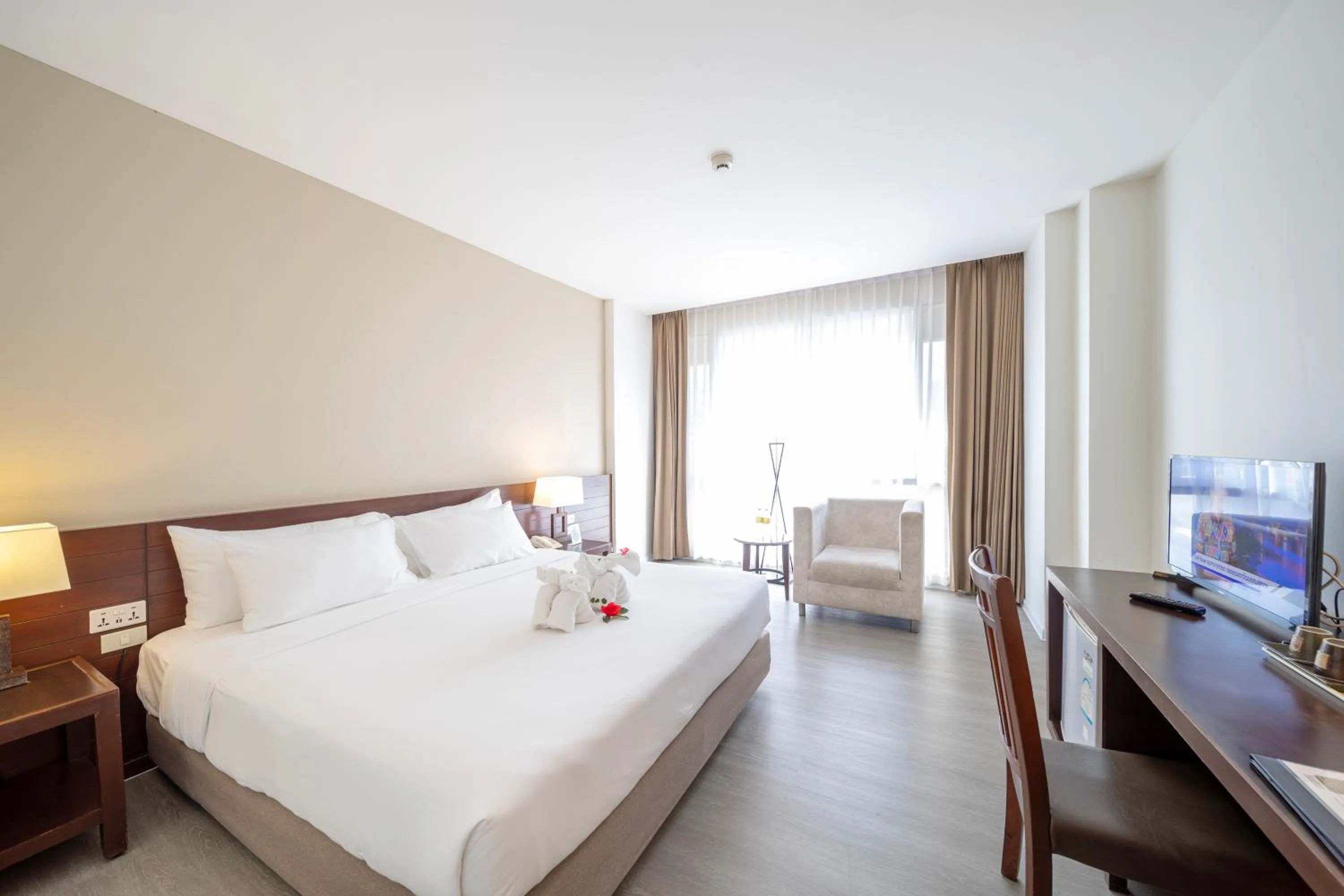 Bed in Golden Crown Grand Hotel