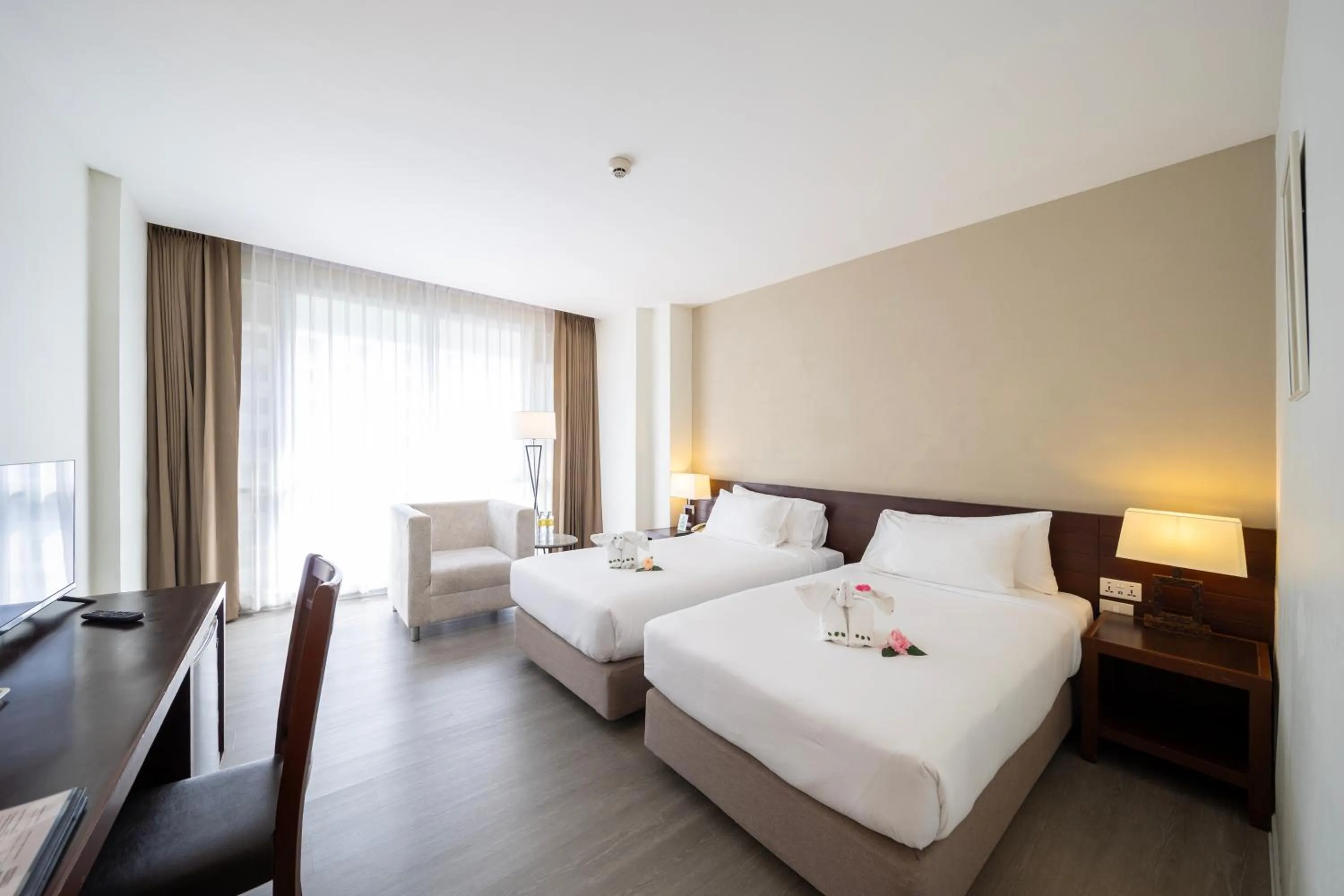 Bed in Golden Crown Grand Hotel