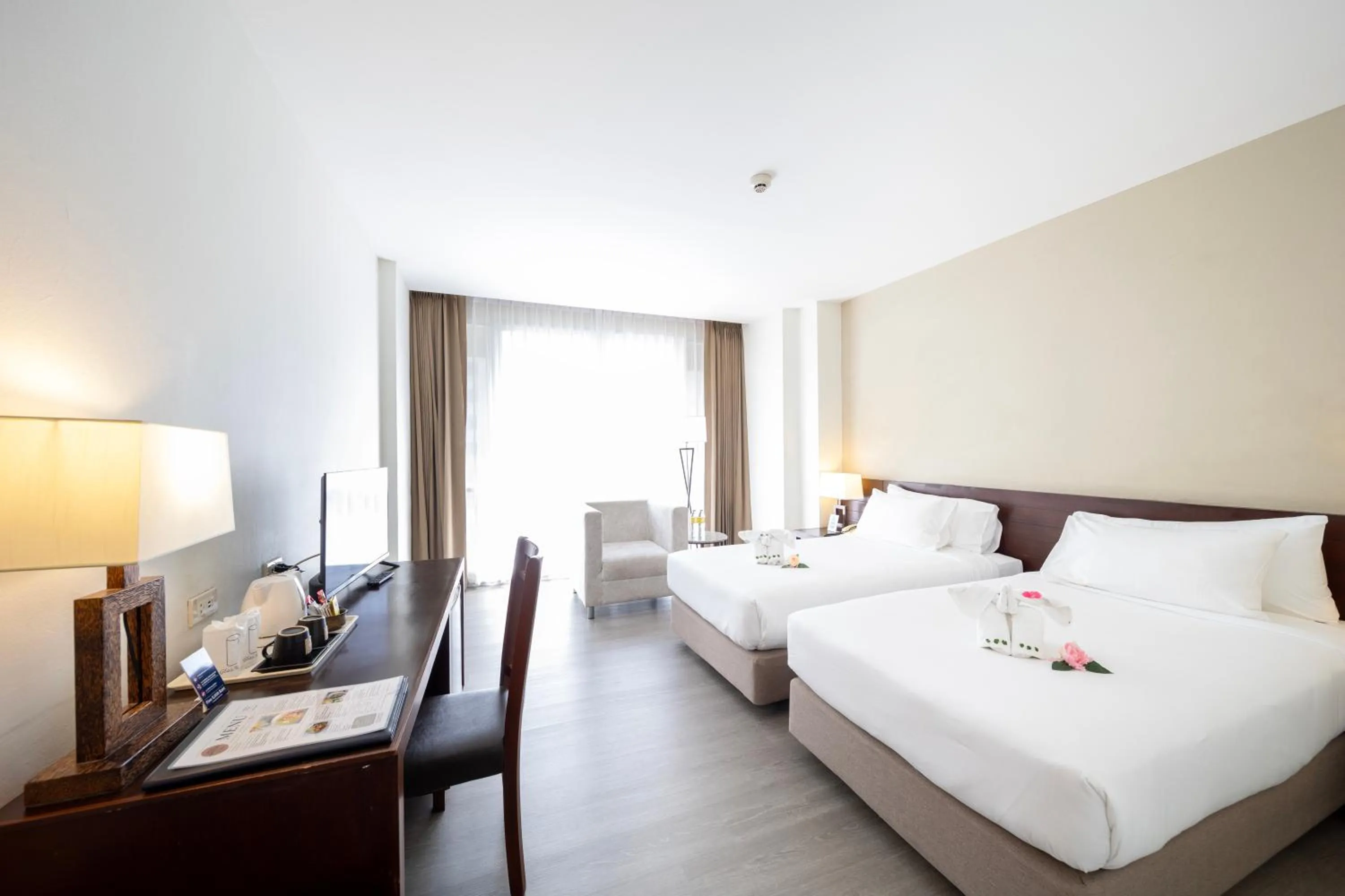 Bed in Golden Crown Grand Hotel