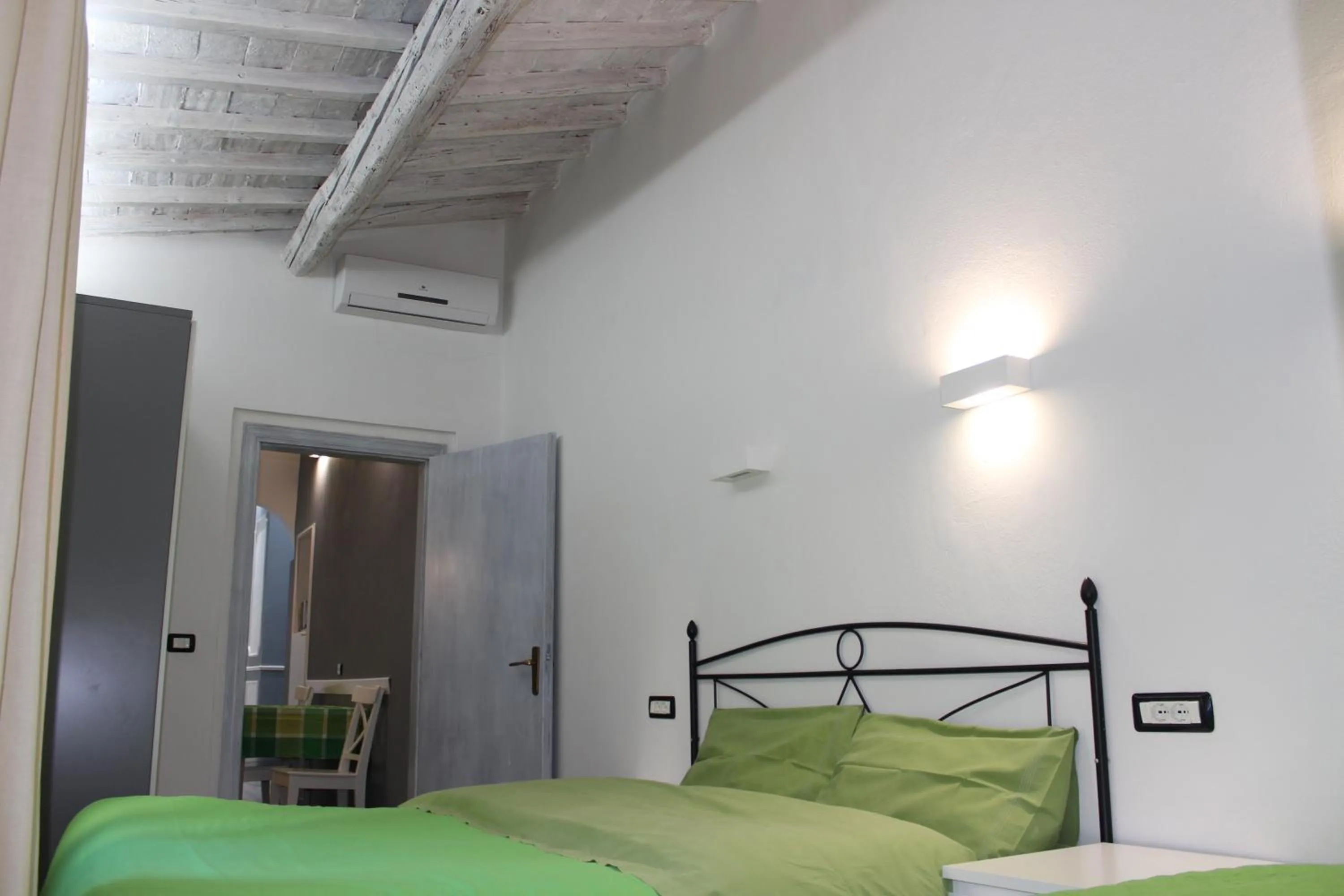 Bed in Max Apartments