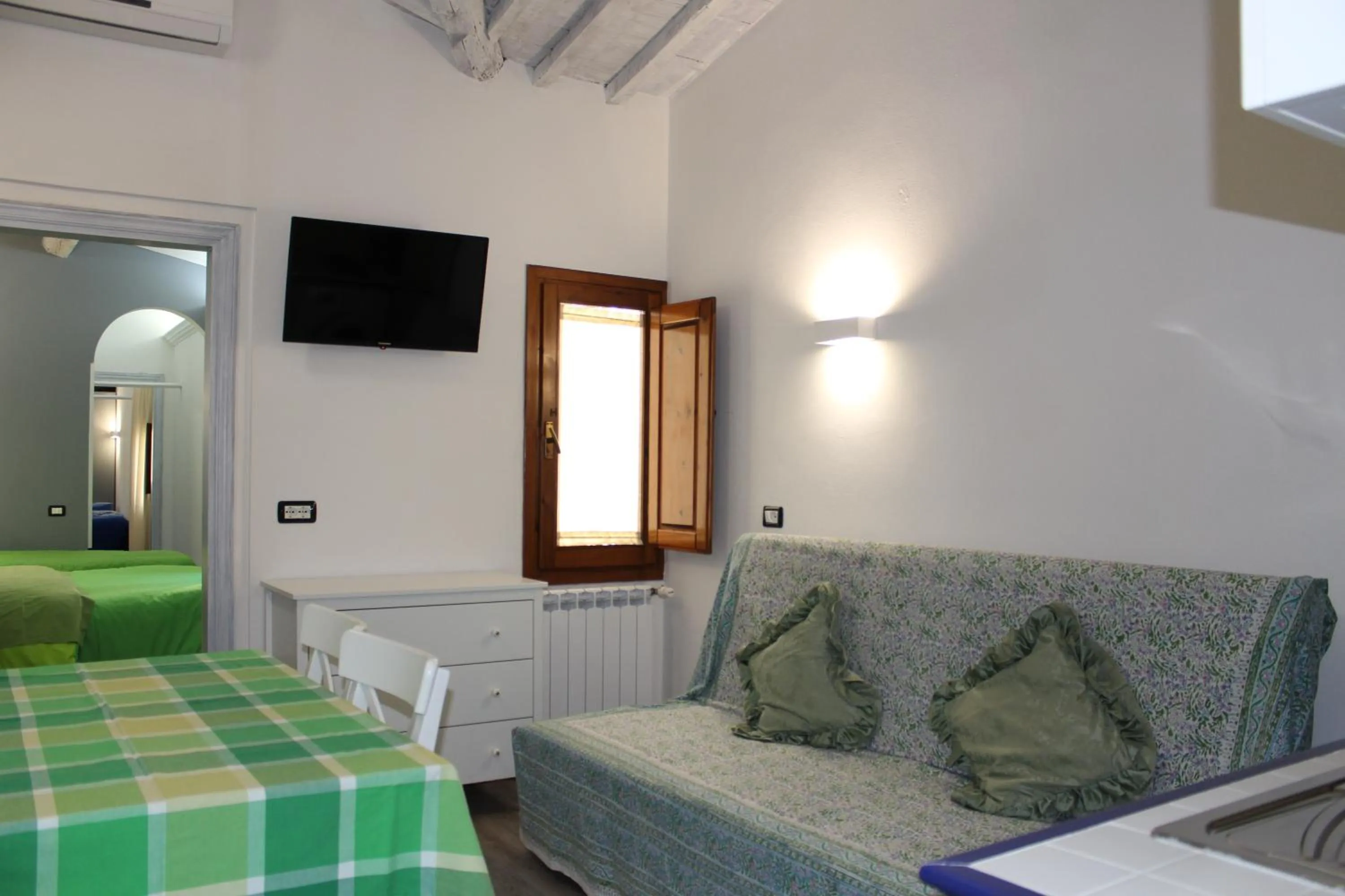 Bed in Max Apartments