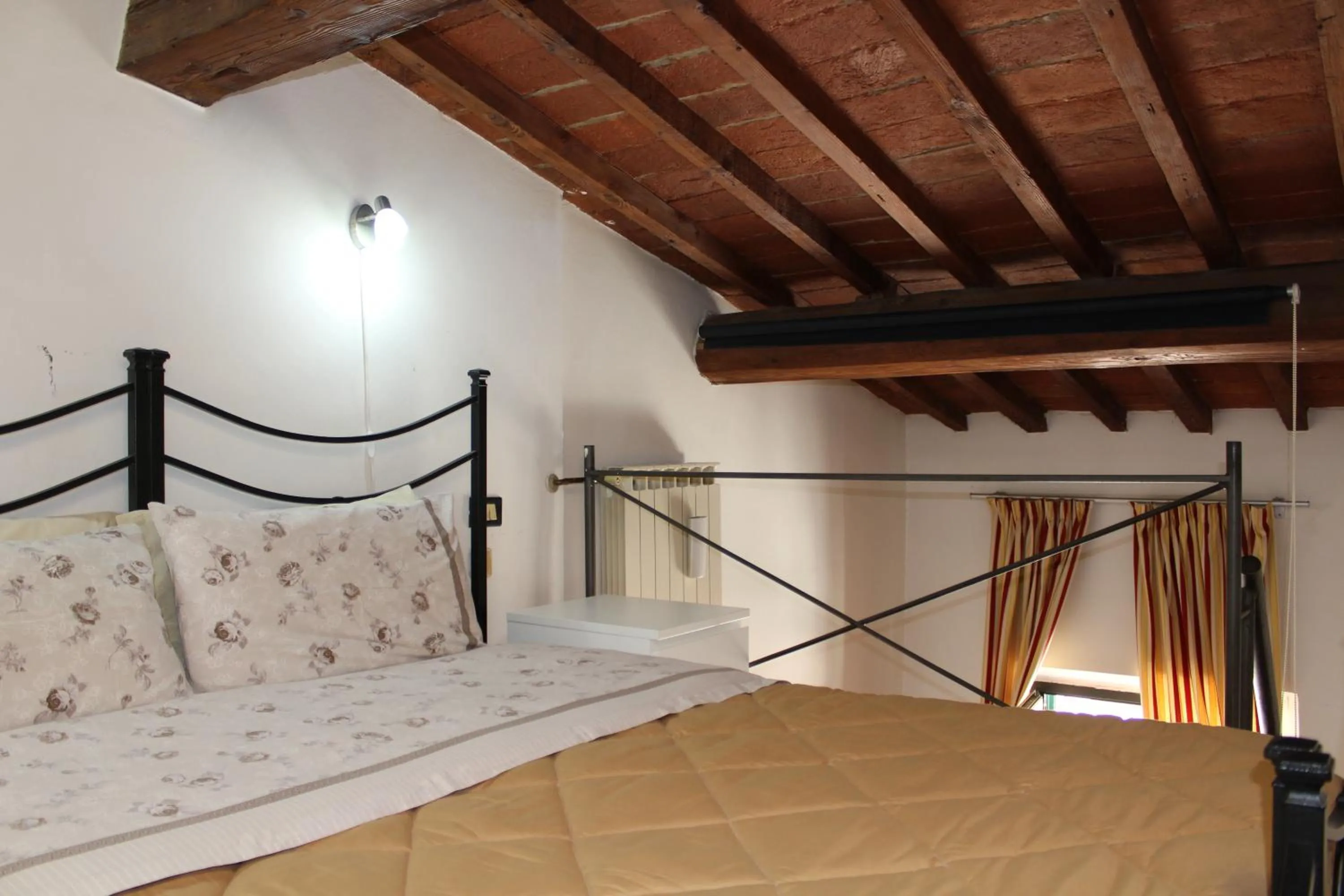 Bed in Max Apartments