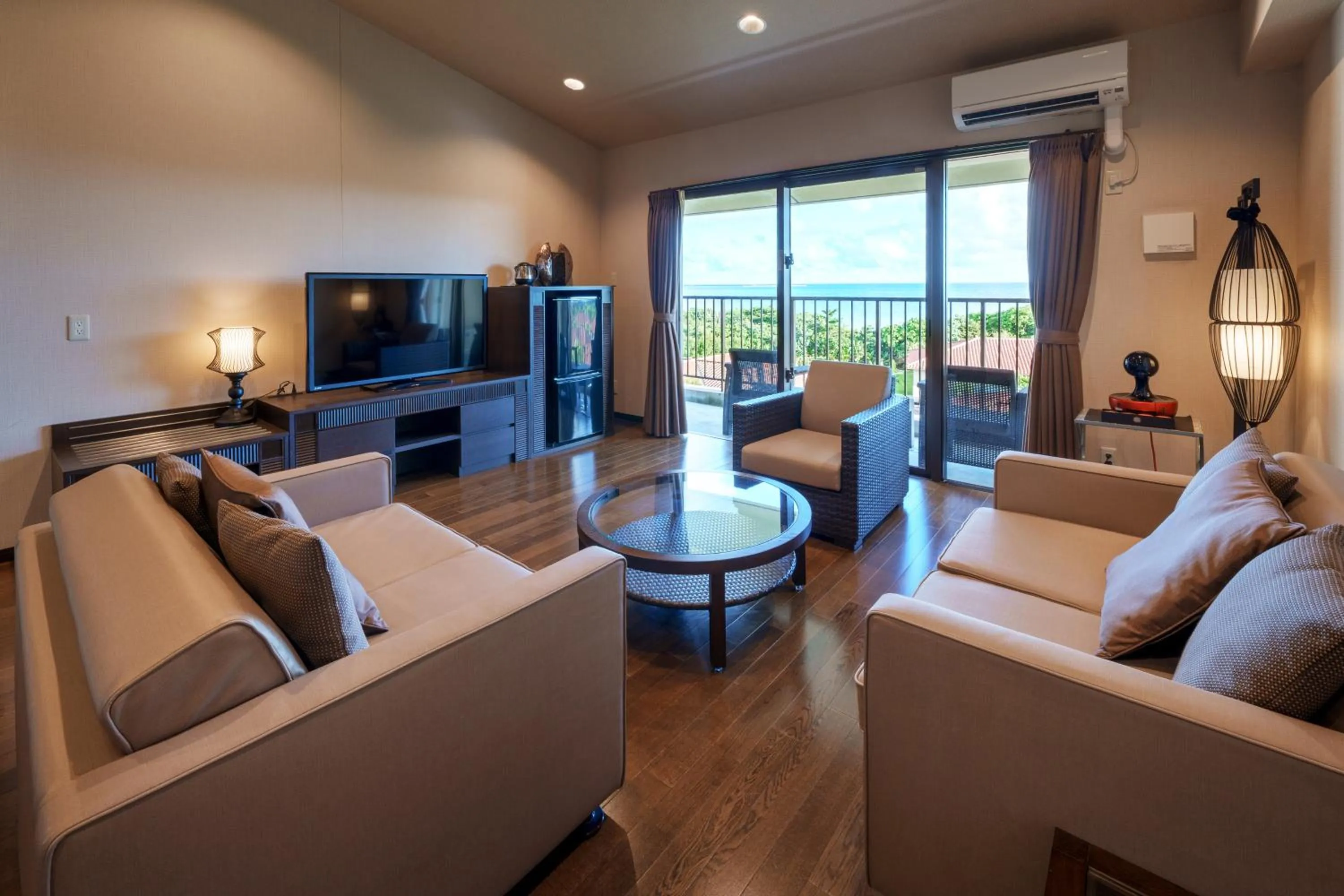 Living room in GRANDVRIORESORT ISHIGAKIJIMA Ocean's Wing & Villa Garden