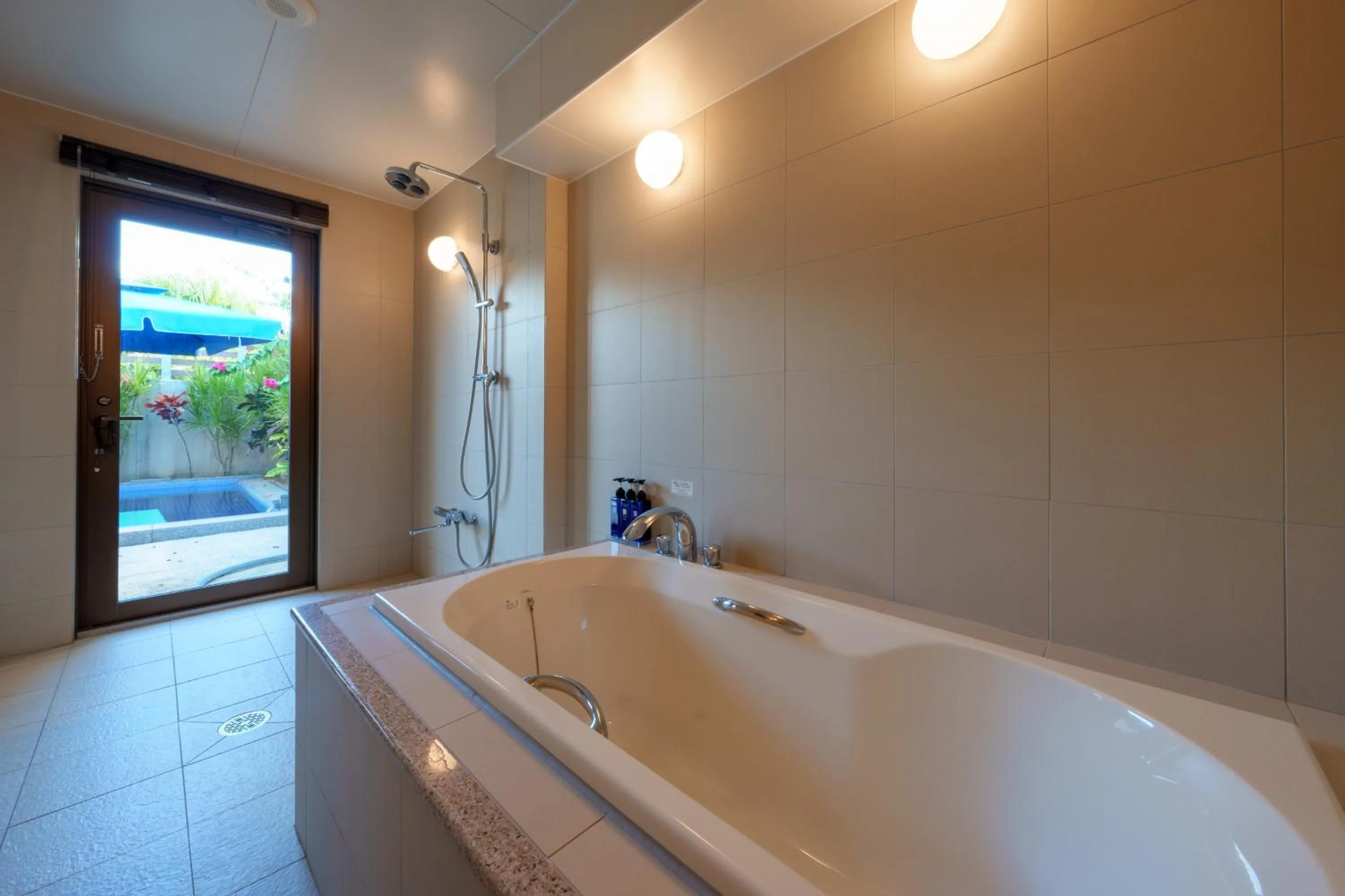 Bathroom in GRANDVRIORESORT ISHIGAKIJIMA Ocean's Wing & Villa Garden