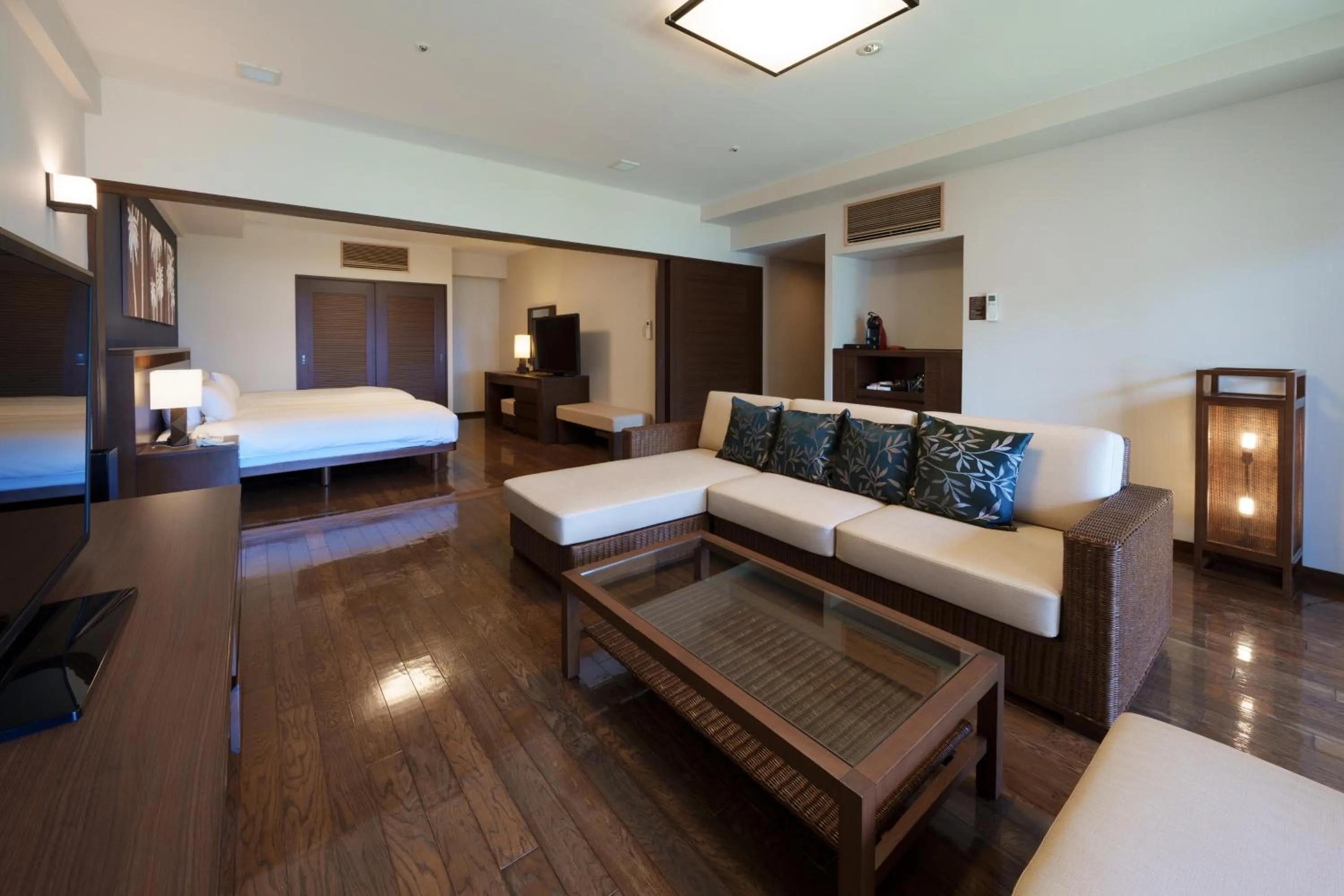 Living room, Bed in GRANDVRIORESORT ISHIGAKIJIMA Ocean's Wing & Villa Garden