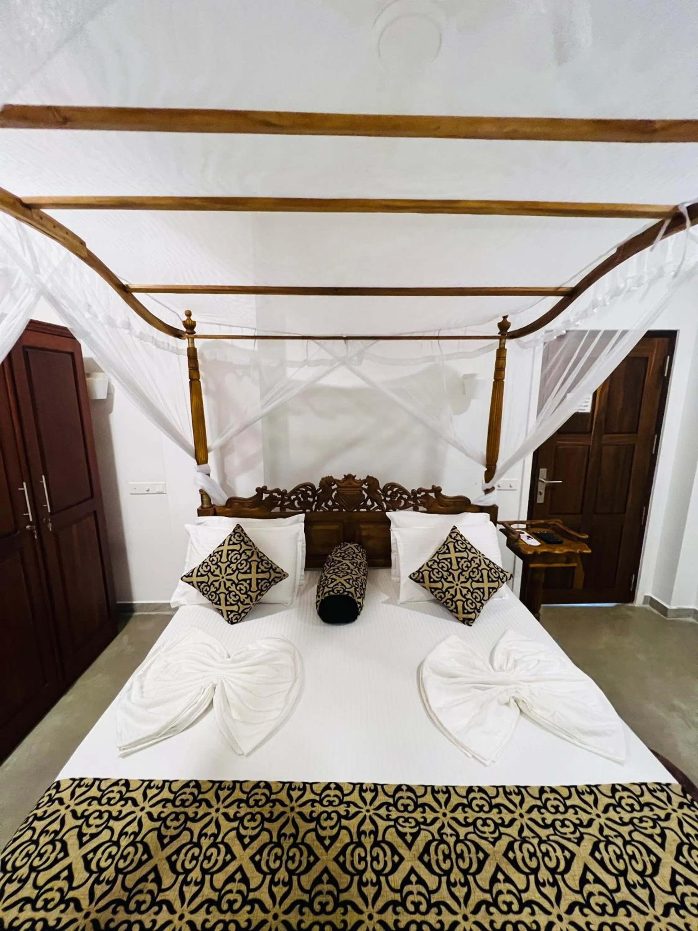 Bed in Top Secret Beach Hotel