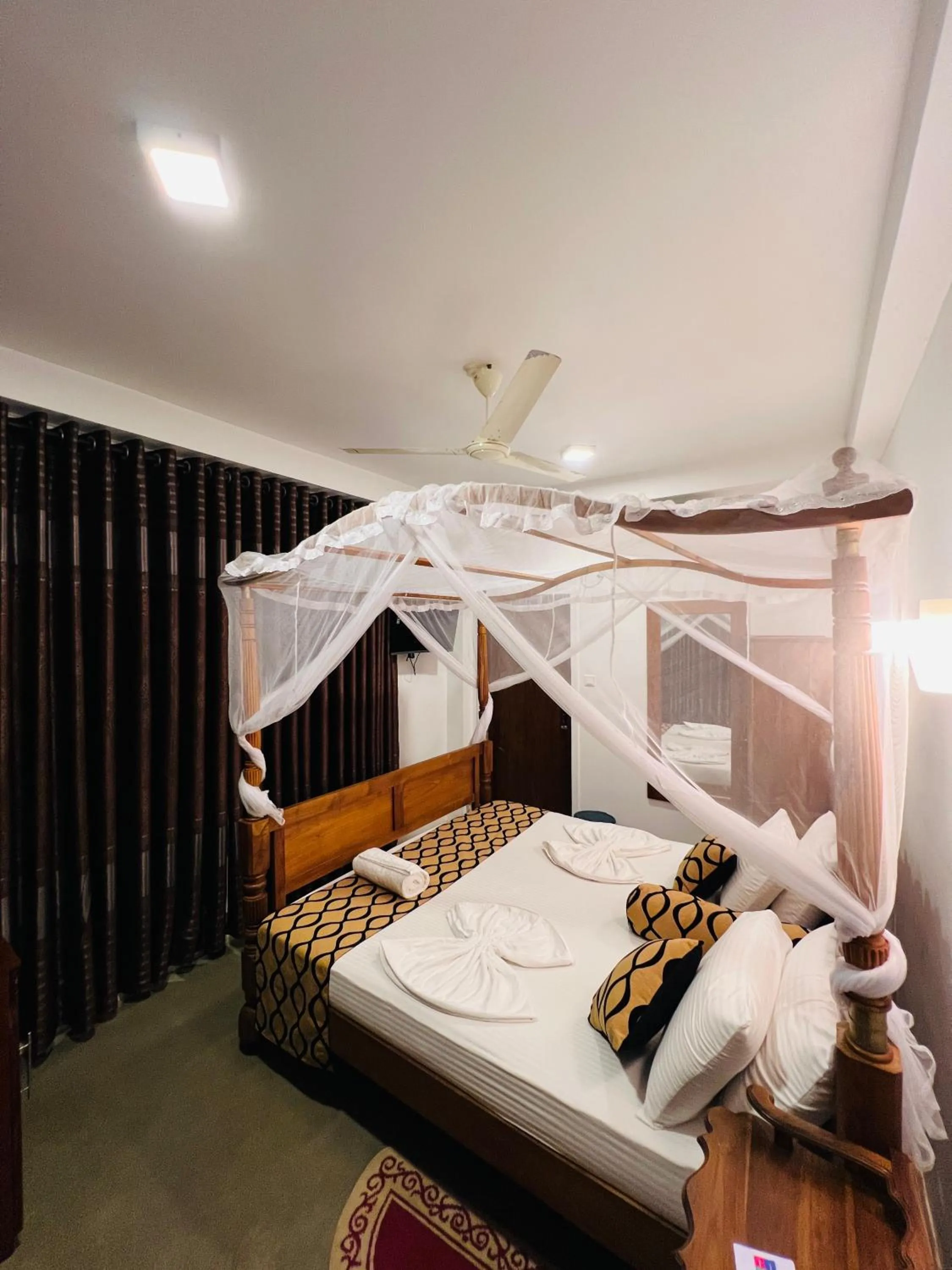 Bed in Top Secret Beach Hotel