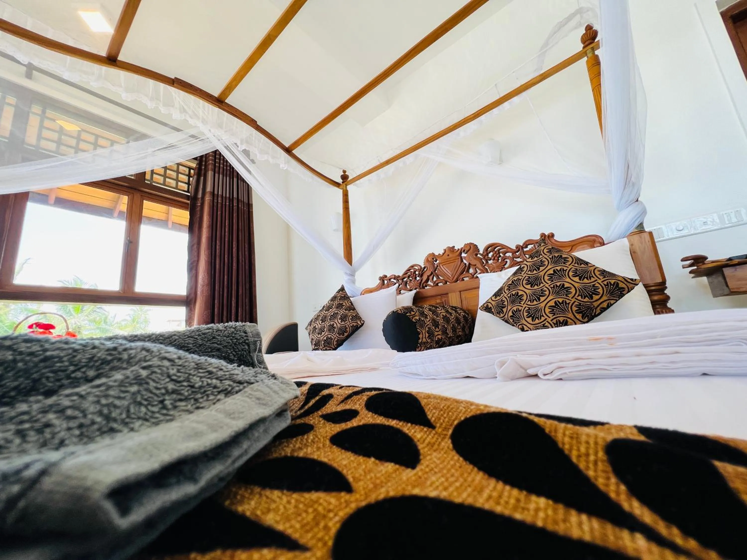 Bed in Top Secret Beach Hotel