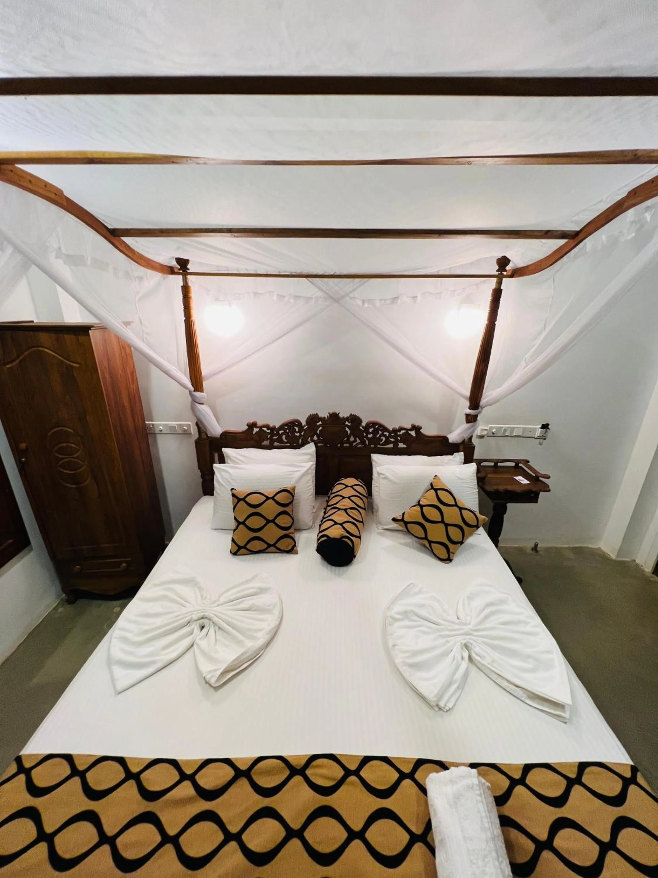 Bed in Top Secret Beach Hotel