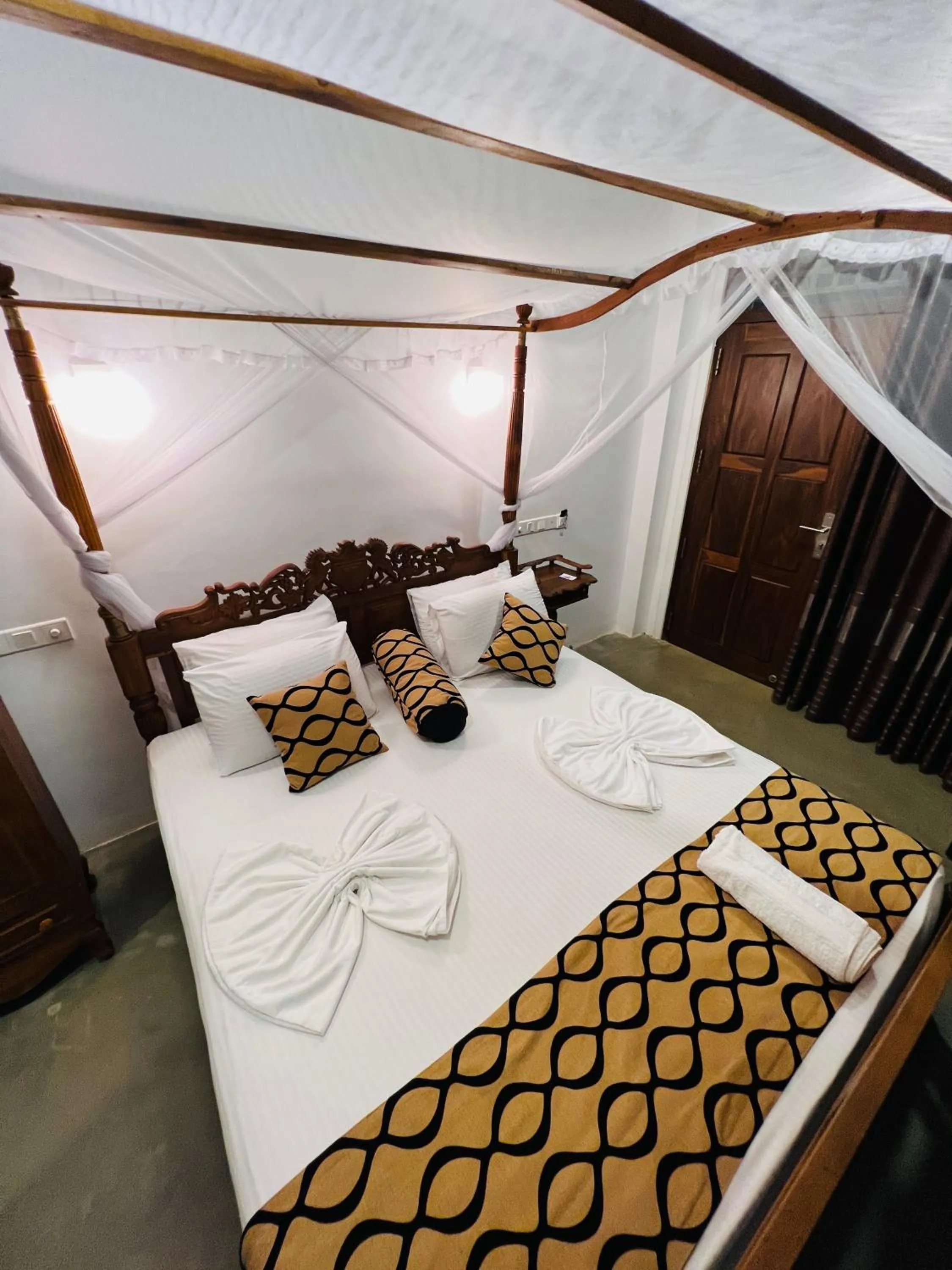 Bed in Top Secret Beach Hotel