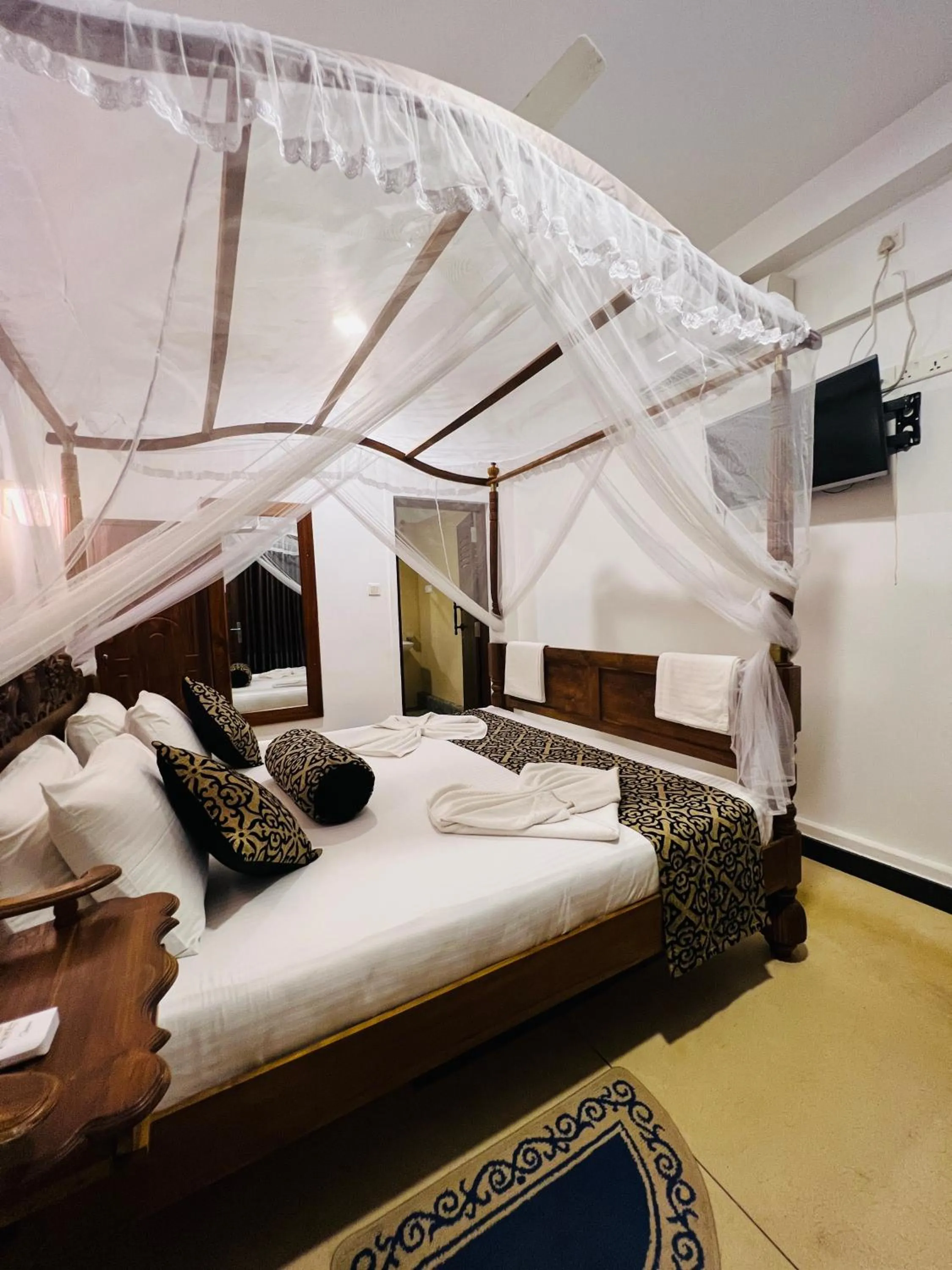 Bed in Top Secret Beach Hotel