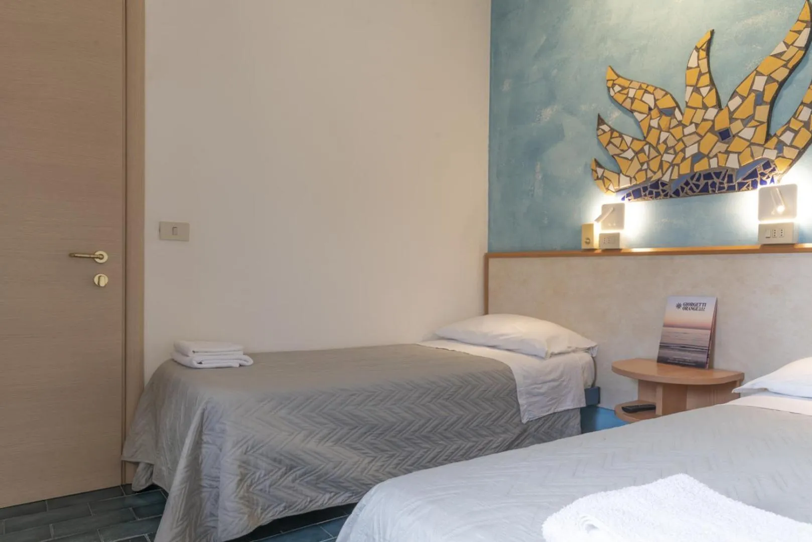 Bed in Hotel Giorgetti Orange