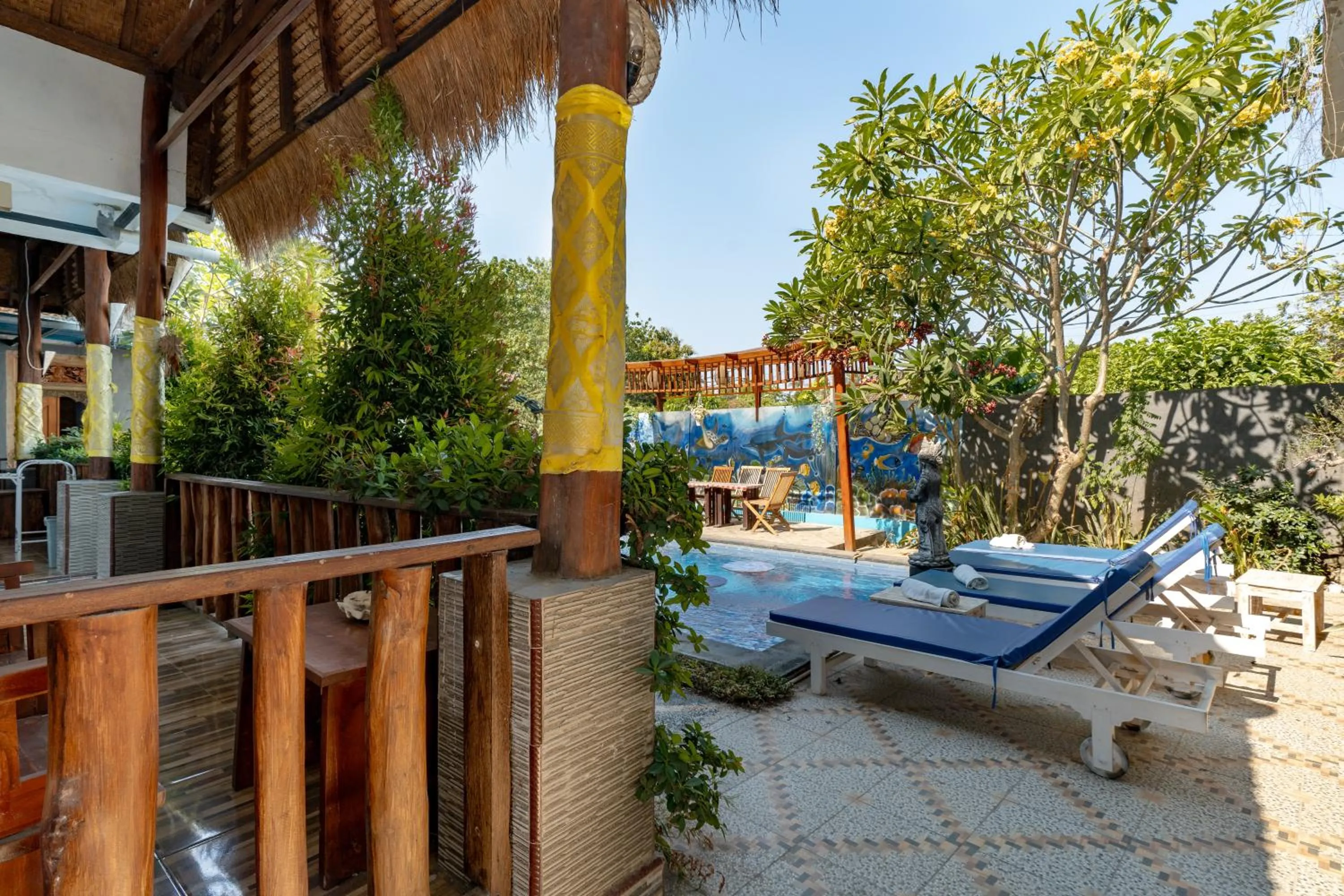 Communal lounge/ TV room in D' Kubon Penida by ABM