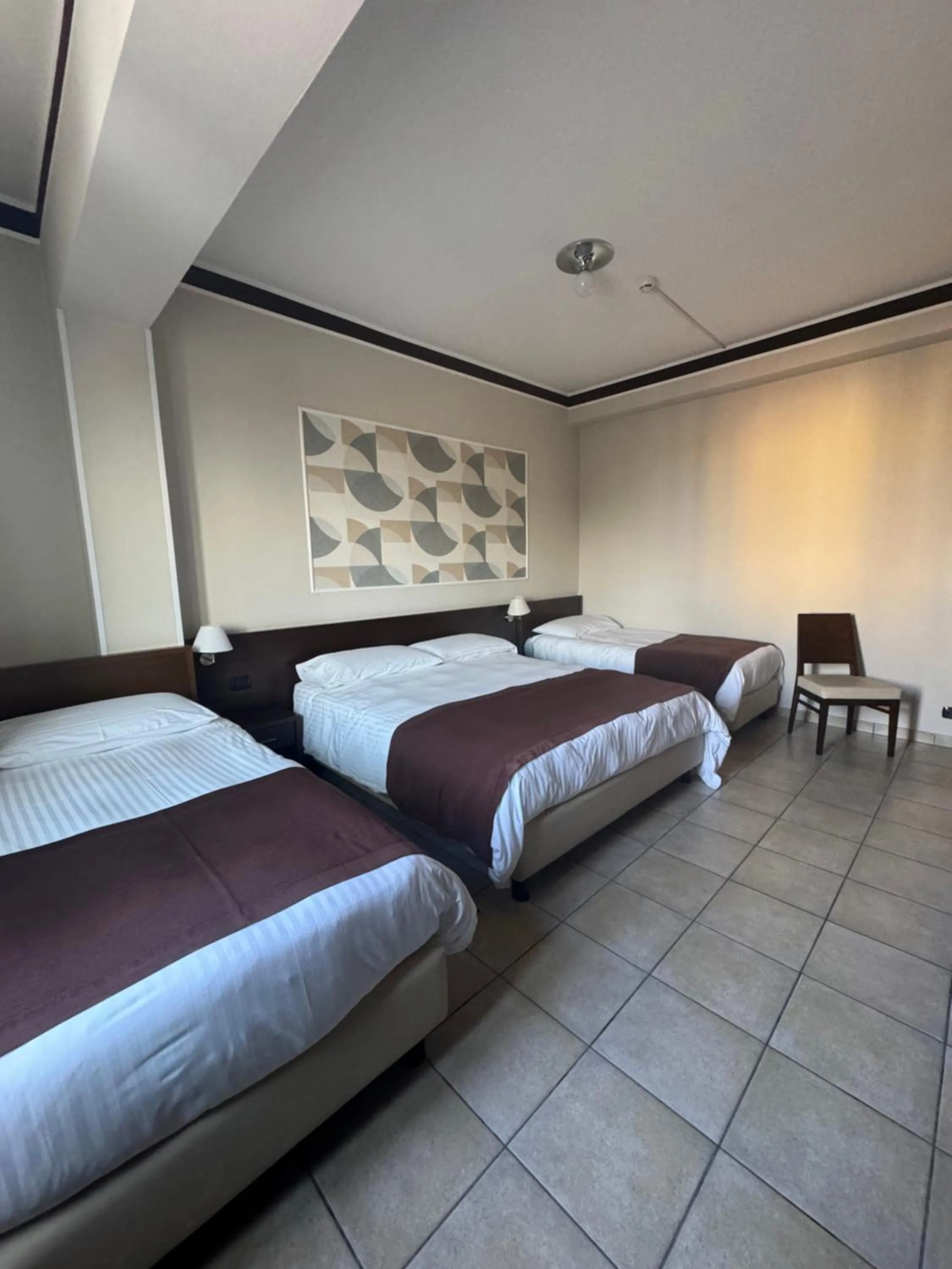 Bed in Hotel Vittoria