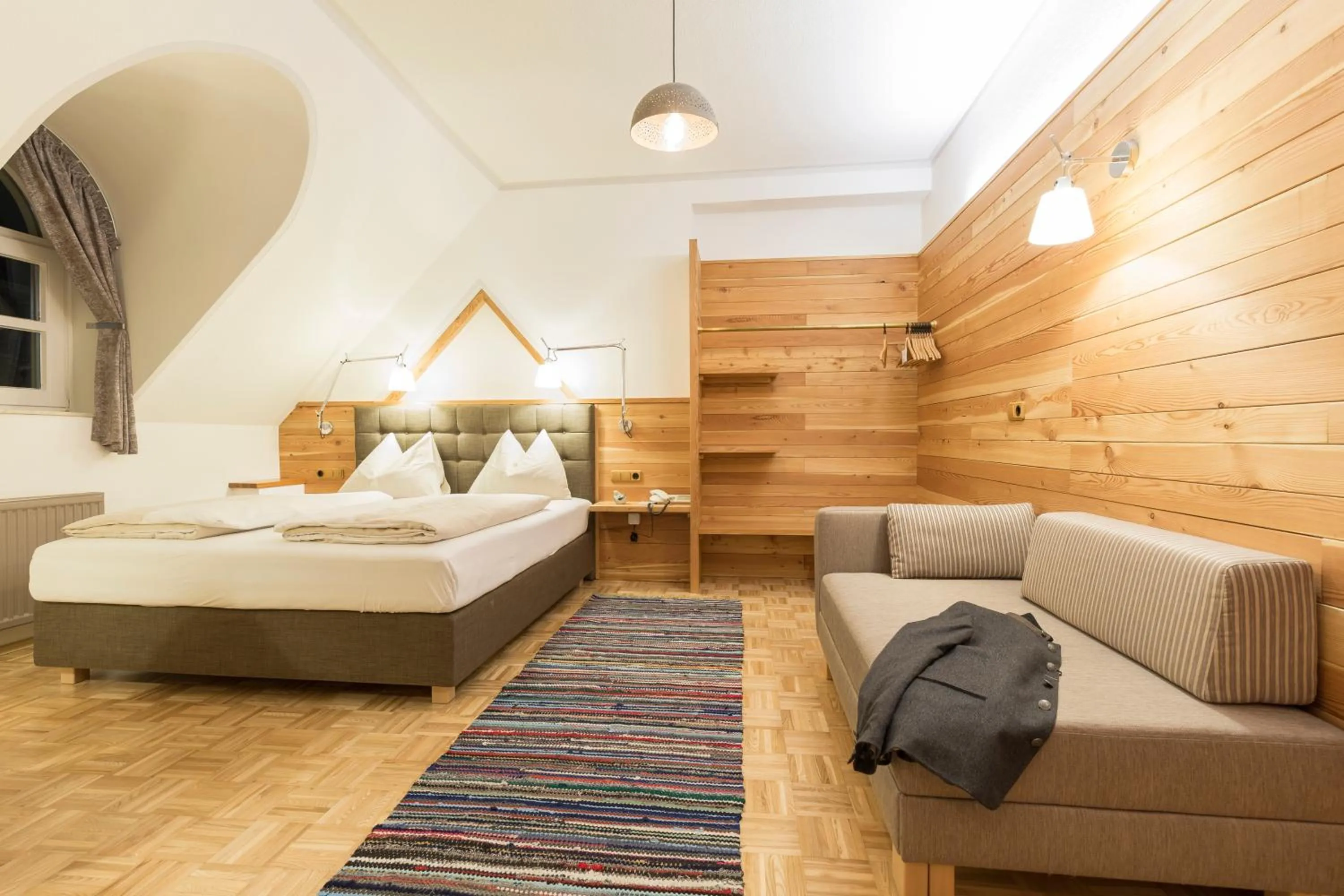 Seating area, Bed in Hotel-Restaurant-Café Krainer