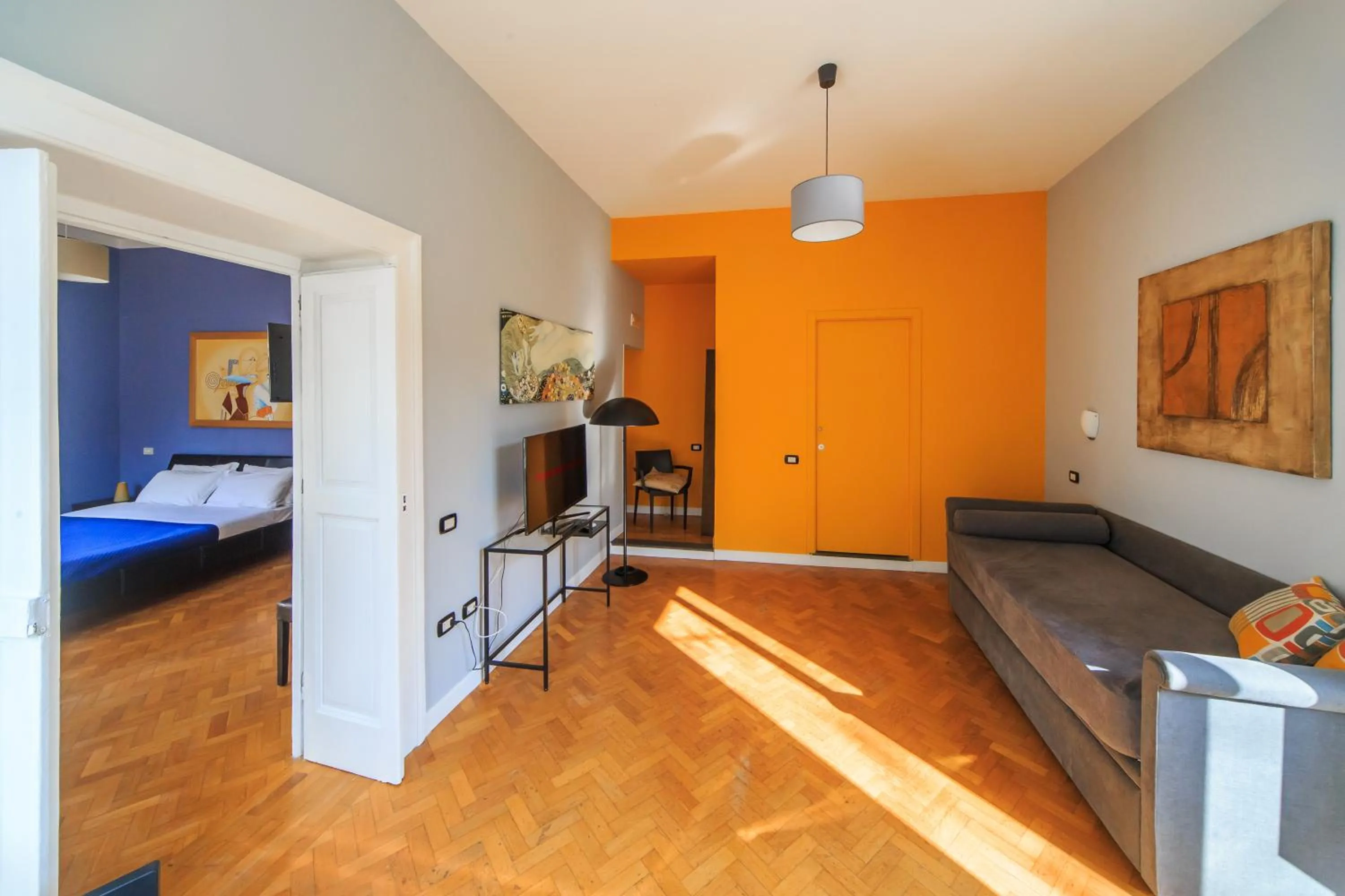 Living room, Bed in Spaccanapoli Comfort Suites