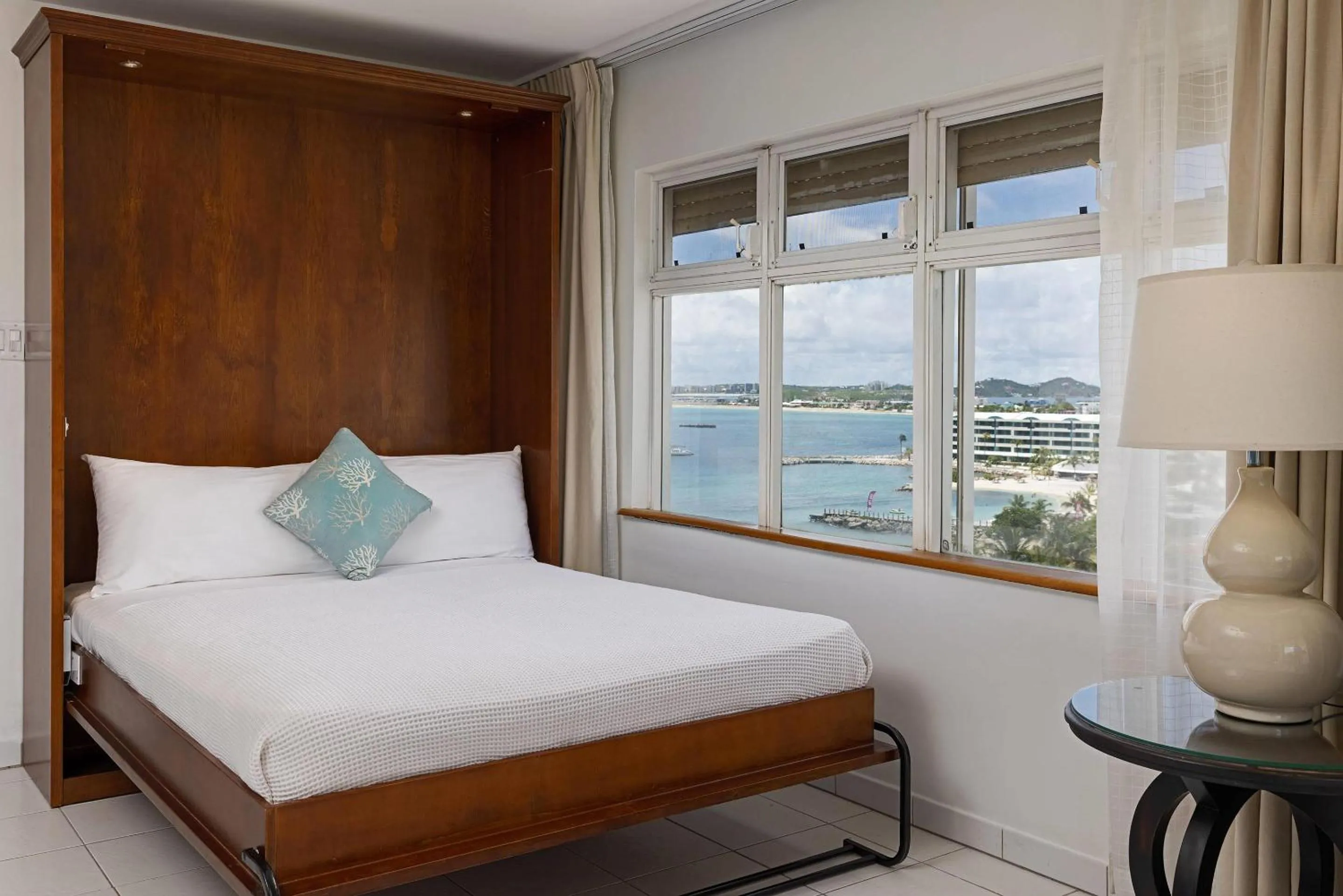 Bedroom, Bed in The Atrium Beach Resort and Spa Sint Maarten, Ascend Hotel Collection