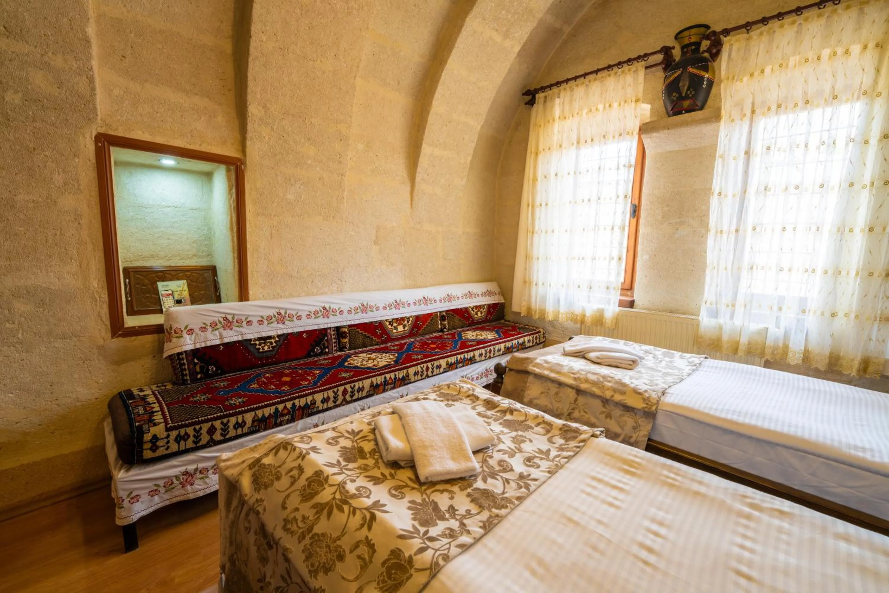 Bed in Asyada Suites Hotel