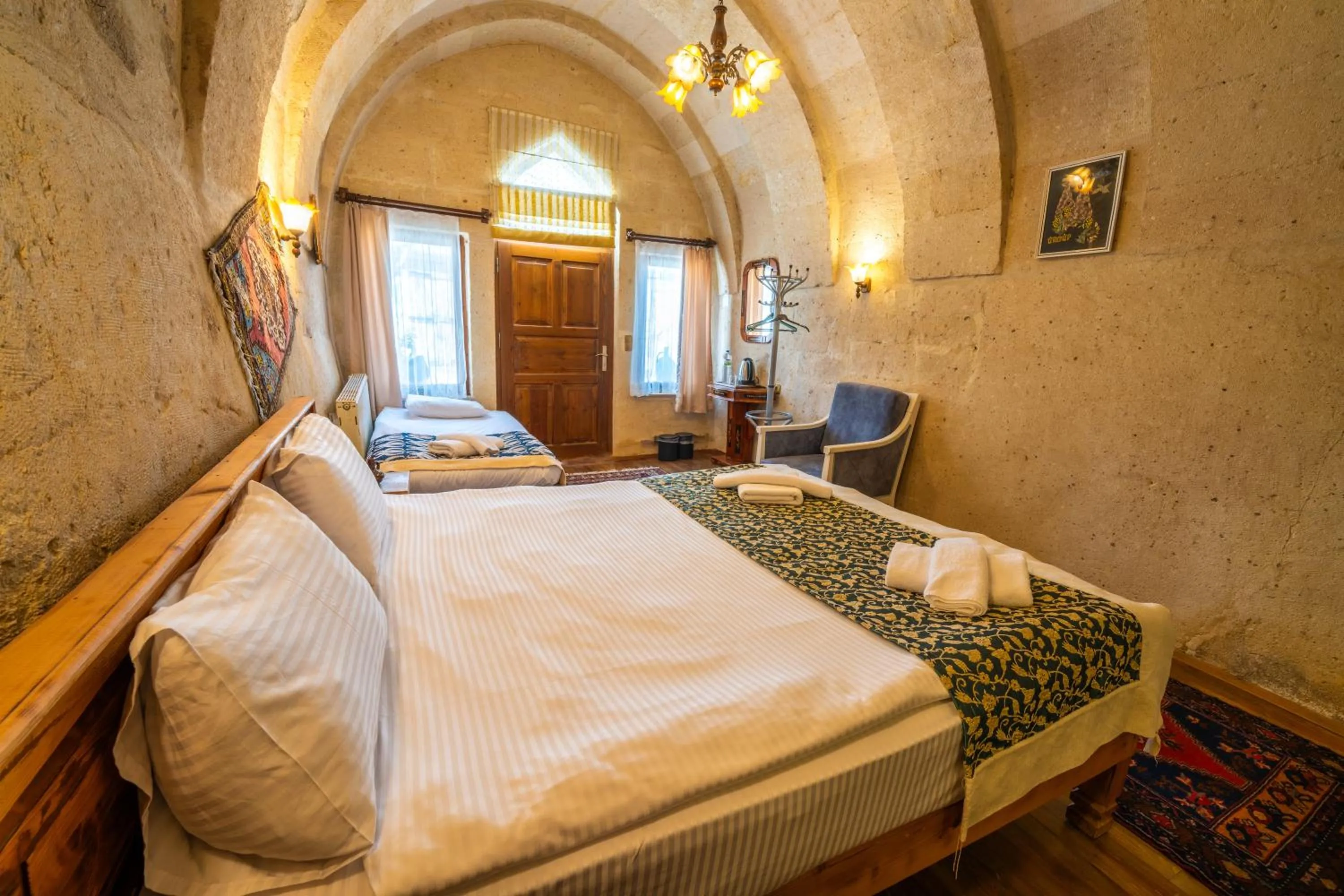 Photo of the whole room, Bed in Asyada Suites Hotel